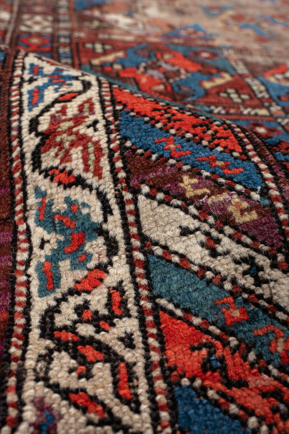3' x 11' one-of-a-kind handmade antique Varamin runner rug. Color palette: brown, camel, indigo, rust, ivory, terra cotta