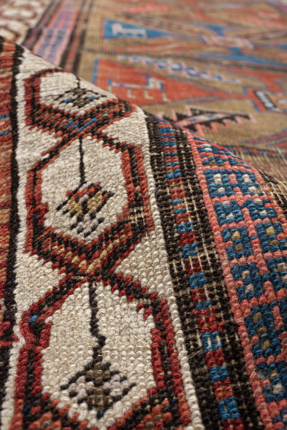 3' x 7' one-of-a-kind handmade vintage Sarab runner rug. Color palette: taupe, camel, indigo, rust, ivory, brown, terracotta