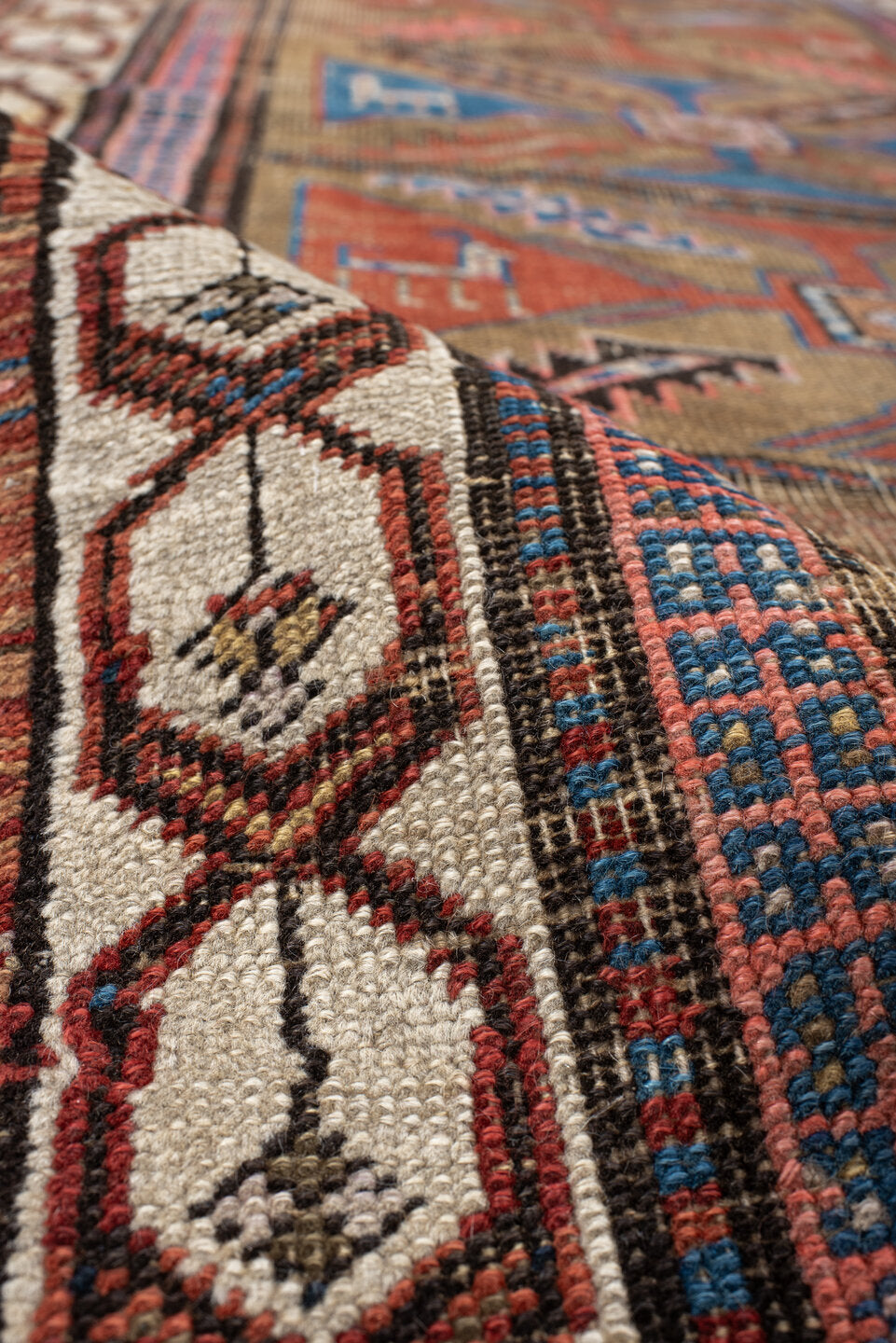 3' x 7' one-of-a-kind handmade vintage Sarab runner rug. Color palette: taupe, camel, indigo, rust, ivory, brown, terracotta