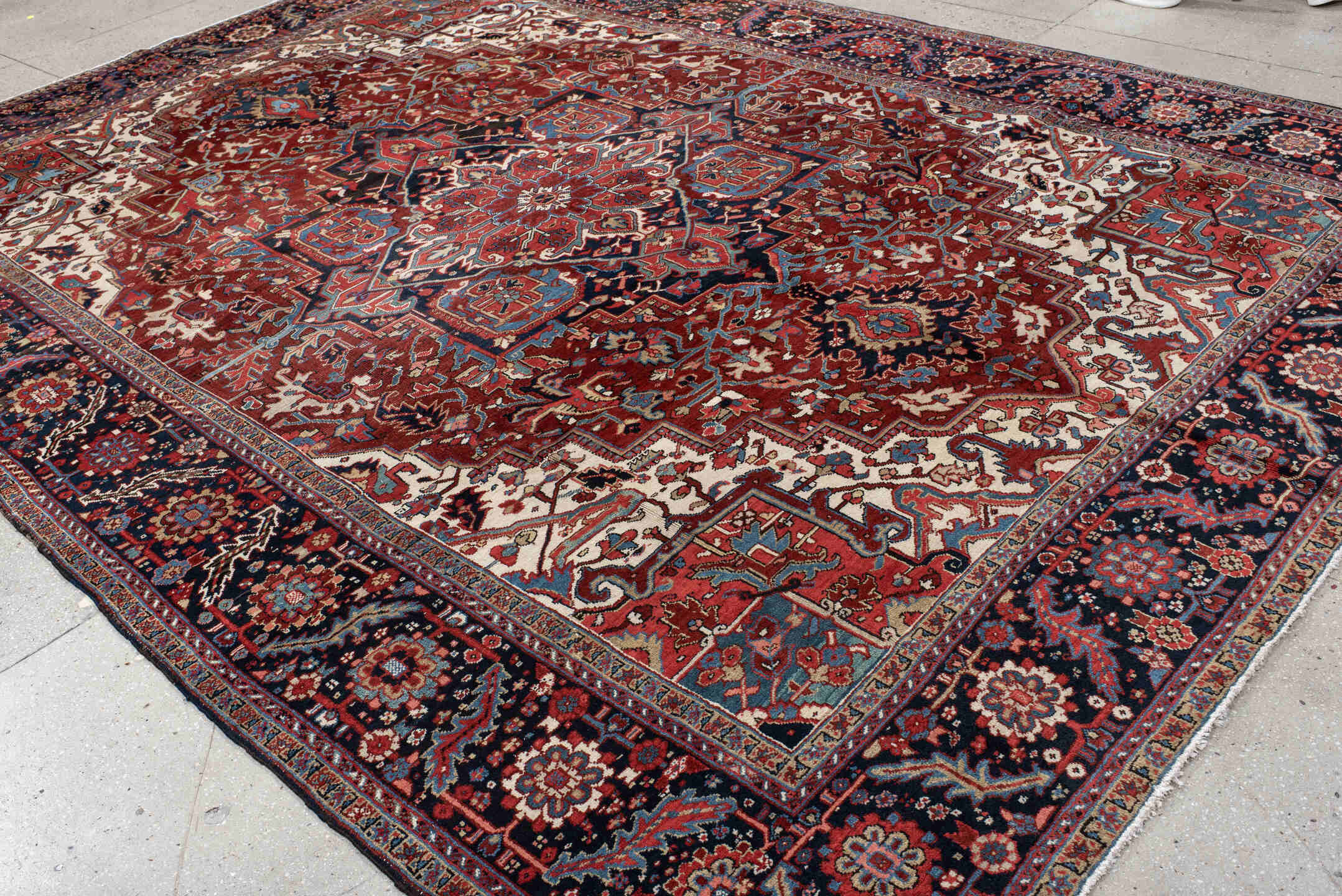 9' x 13' one-of-a-kind handmade antique Heriz large size rug. Color palette: rust, navy, ivory, sky_blue, crimson, camel