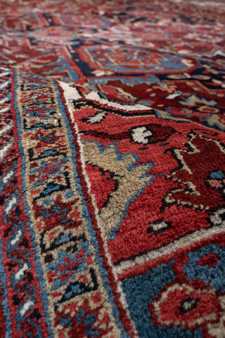 9' x 13' one-of-a-kind handmade antique Heriz large size rug. Color palette: rust, navy, ivory, sky_blue, crimson, camel
