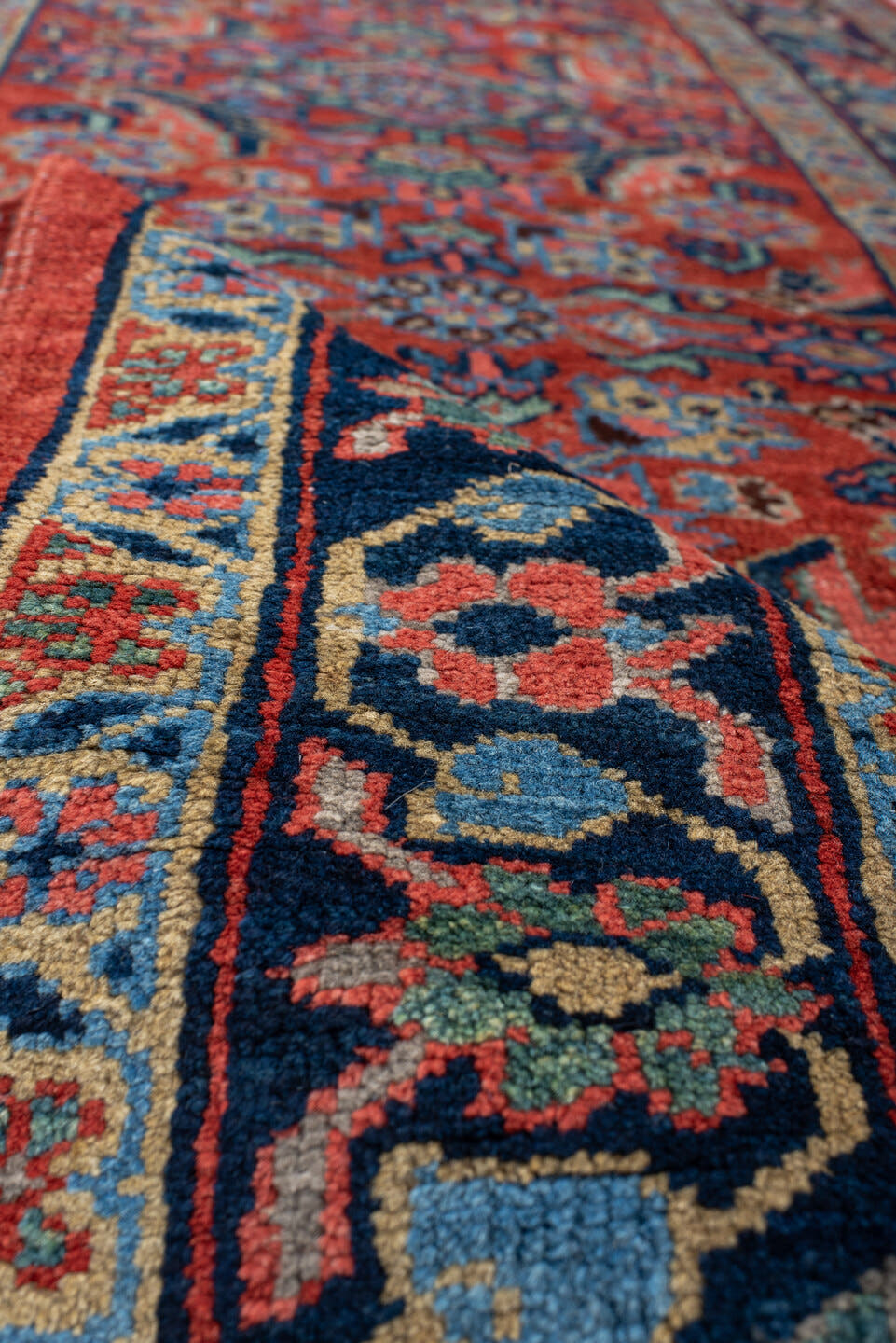 3' x 18' one-of-a-kind handmade vintage Heriz runner rug. Color palette: rust, navy, ivory, sky_blue, coral, camel