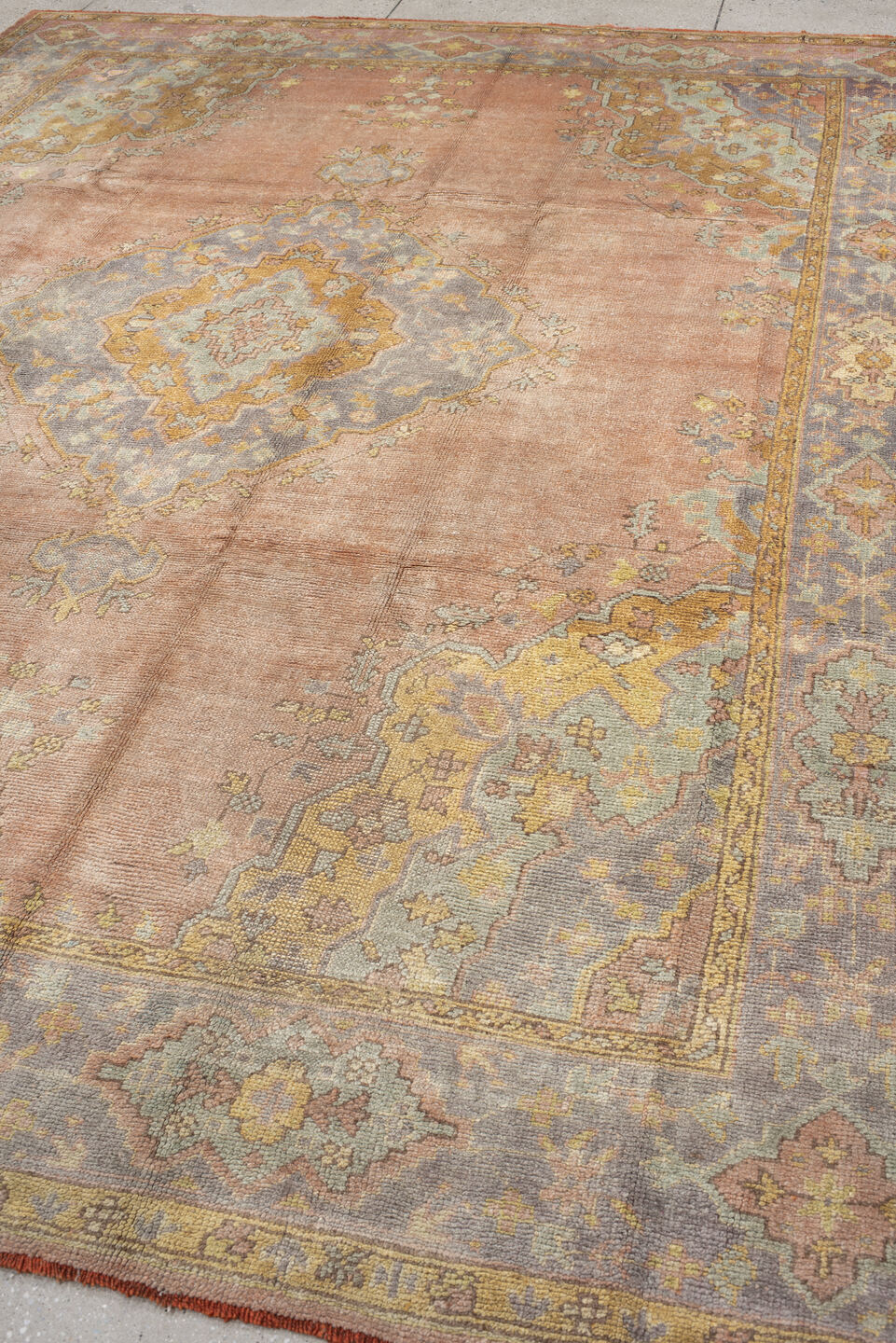 8' x 11' one-of-a-kind handmade antique Oushak large size rug. Color palette: blush, powder blue, gold, ivory, sage, peach
