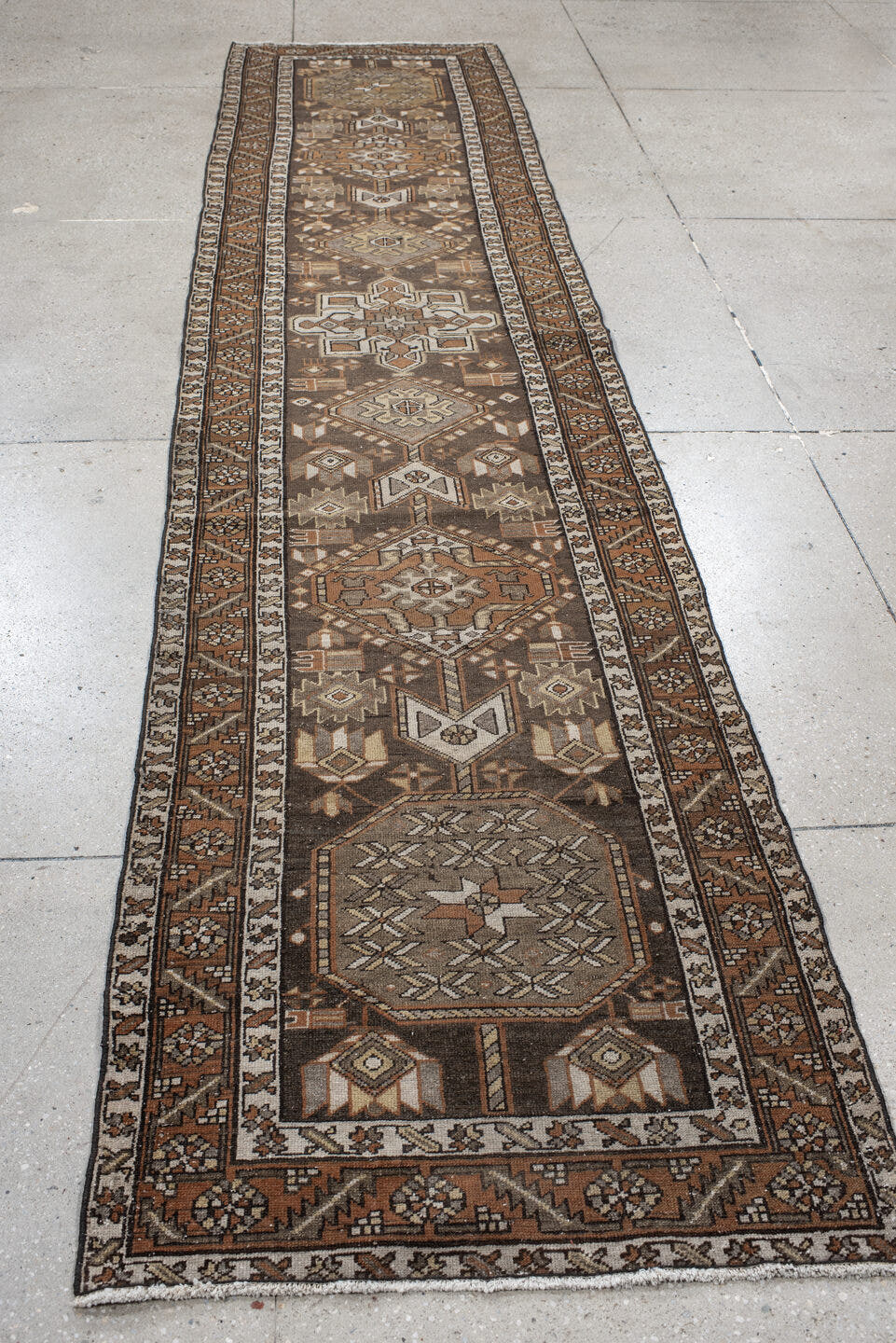 2' x 12' one-of-a-kind handmade vintage Karaje runner rug. Color palette: brown, taupe, rust, ivory, camel, charcoal, beige