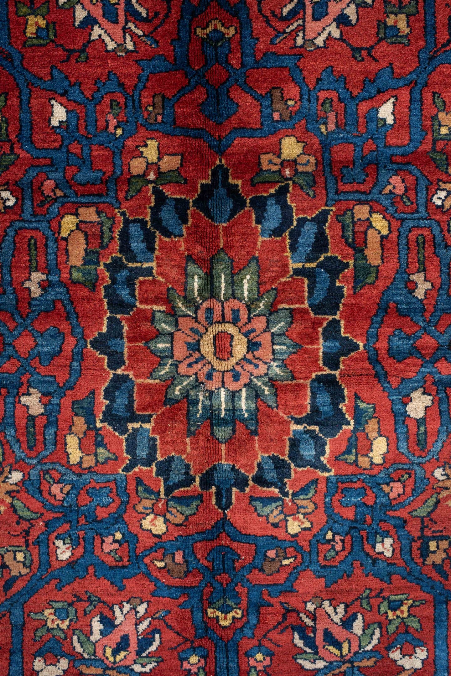 14' x 16' one-of-a-kind handmade vintage Baktiary oversize rug. Color palette: ivory, rust, navy, terracotta, indigo, rose
