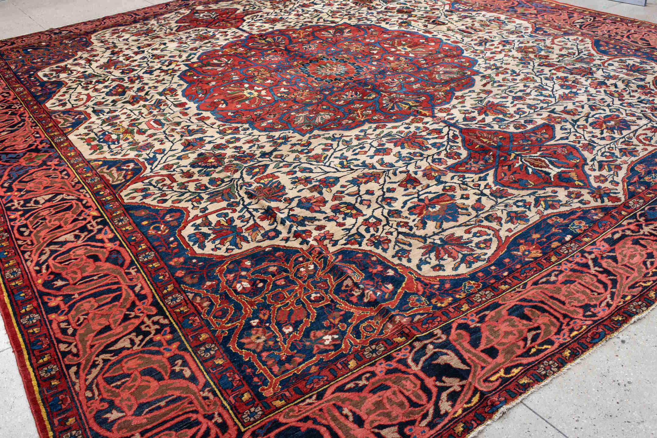 14' x 16' one-of-a-kind handmade vintage Baktiary oversize rug. Color palette: blue, brown, gray, light gray, off-white