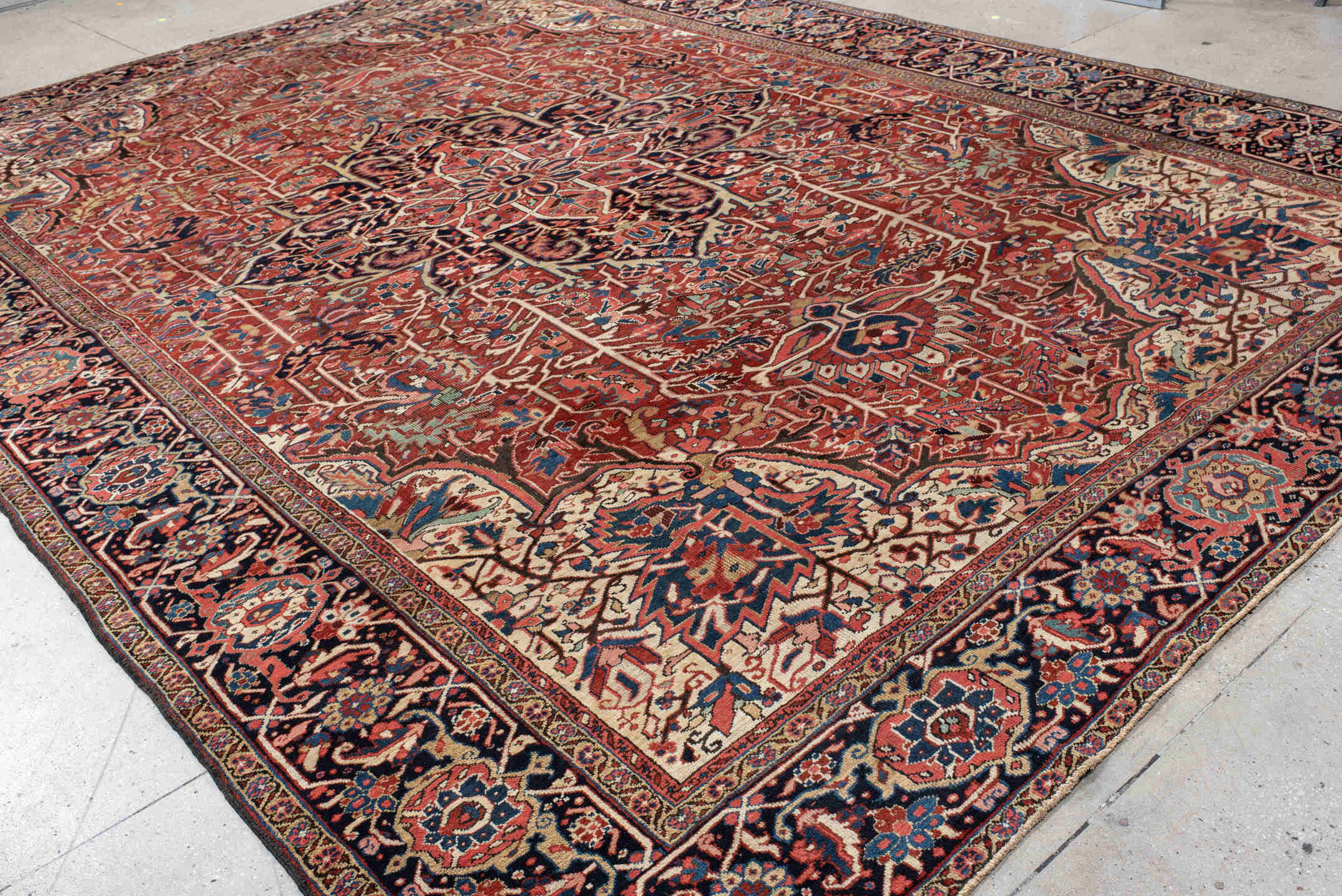 11' x 15' one-of-a-kind handmade vintage Heriz oversize rug. Color palette: rust, ivory, navy, sky_blue, rose, teal