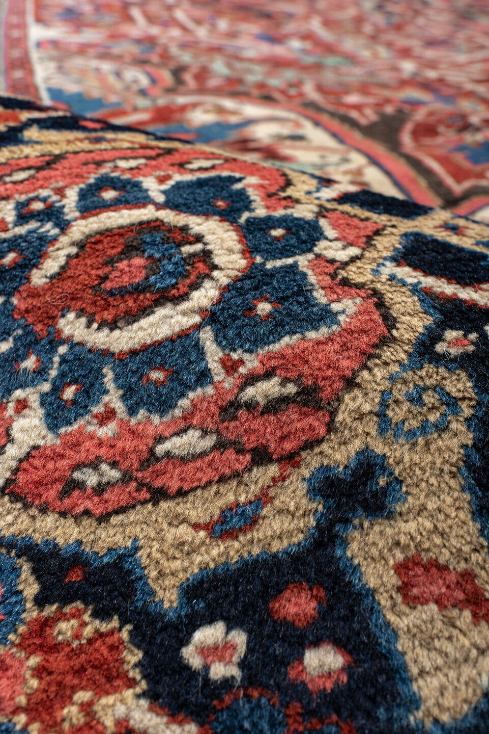 11' x 15' one-of-a-kind handmade vintage Heriz oversize rug. Color palette: rust, ivory, navy, sky_blue, rose, teal