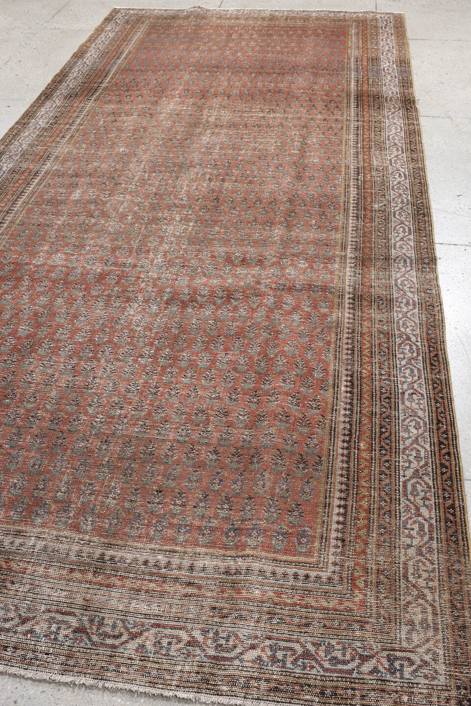 5' x 12' one-of-a-kind handmade antique Malayer rug. Color palette: rust, ivory, slate, taupe, terra cotta, charcoal, brown