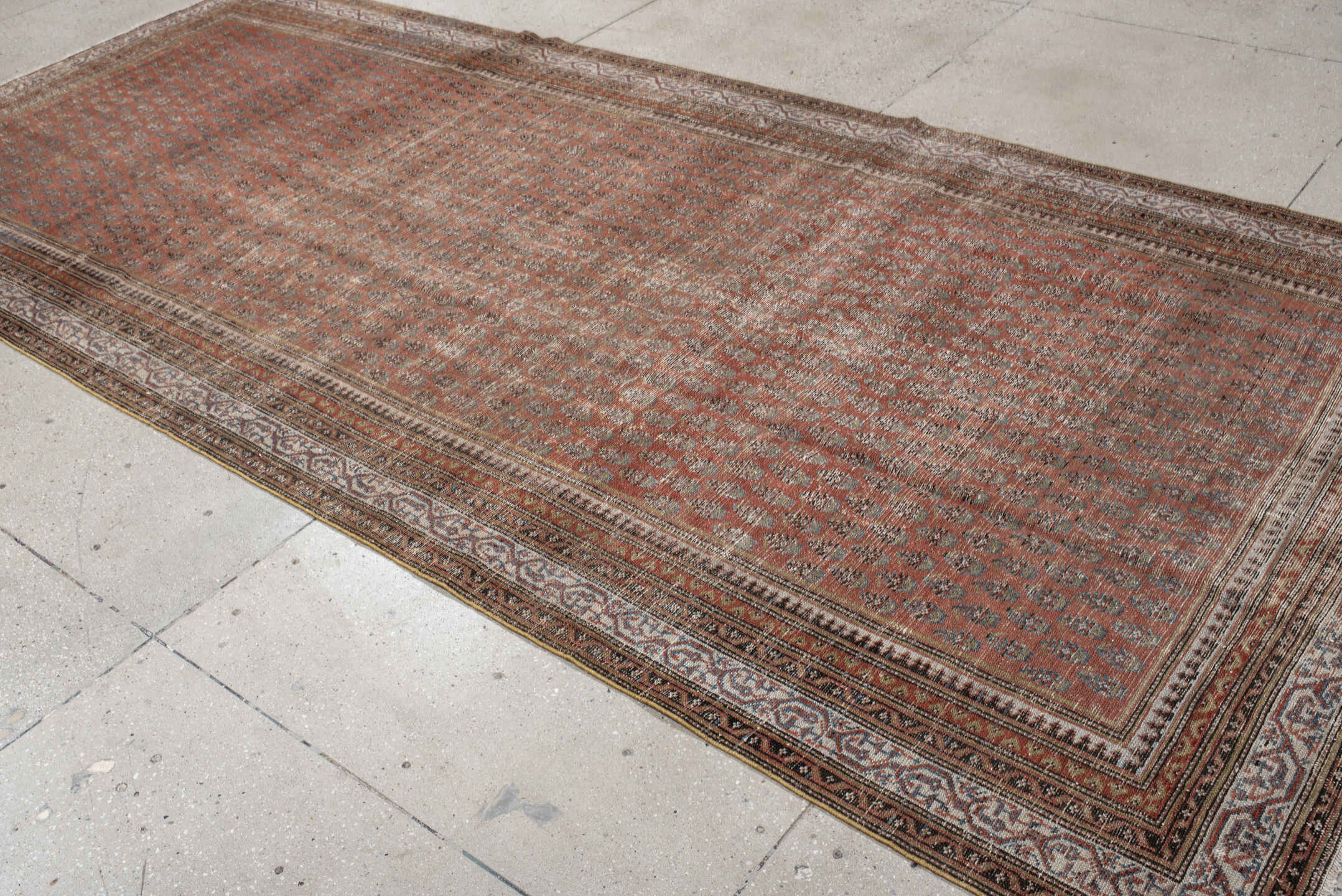 5' x 12' one-of-a-kind handmade antique Malayer rug. Color palette: rust, ivory, slate, taupe, terra cotta, charcoal, brown