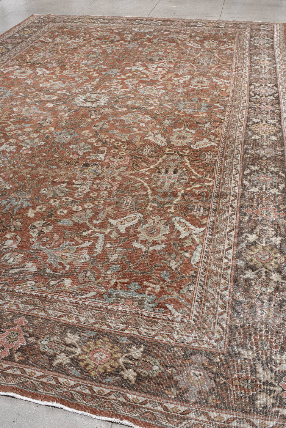 10' x 16' one-of-a-kind handmade antique Mahal rug. Color palette: terra cotta, taupe, brown, ivory, sage, slate, rose