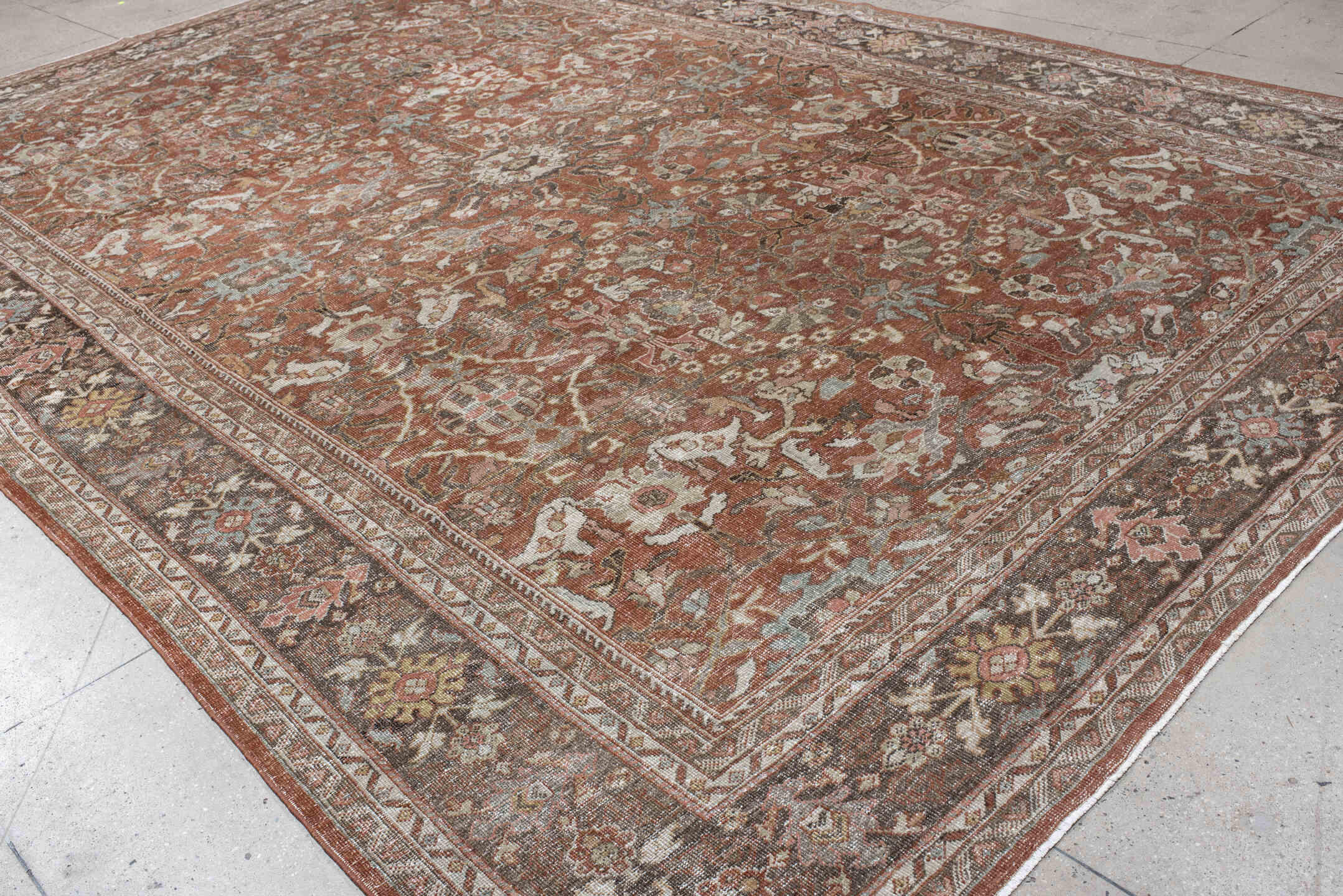 10' x 16' one-of-a-kind handmade antique Mahal rug. Color palette: terra cotta, taupe, brown, ivory, sage, slate, rose