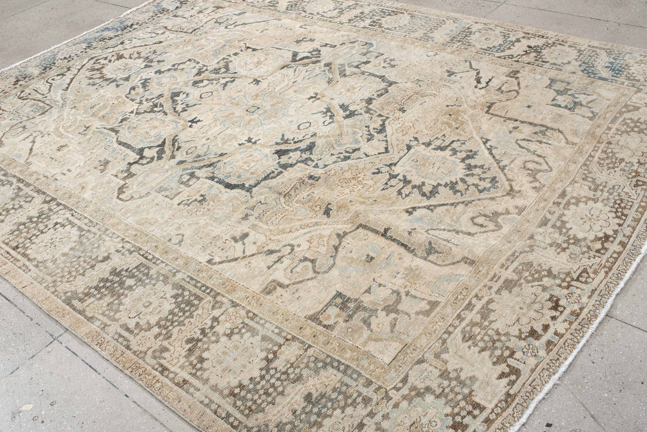 8' x 10' one-of-a-kind handmade antique Heriz large size rug. Color palette: ivory, taupe, slate, charcoal, beige, pale blue