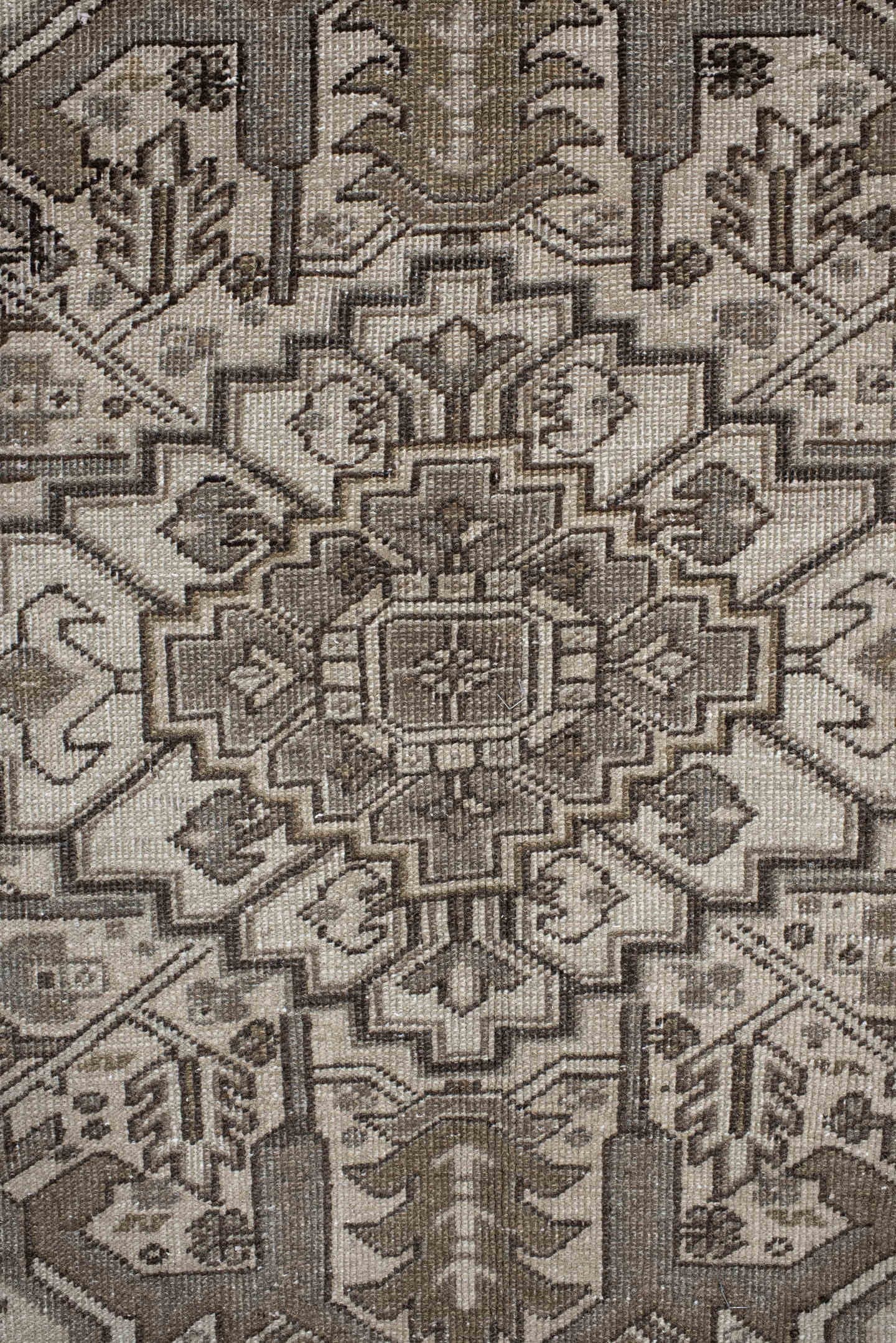 9' x 12' one-of-a-kind handmade antique Heriz large size rug. Color palette: taupe, ivory, brown, camel, charcoal, beige