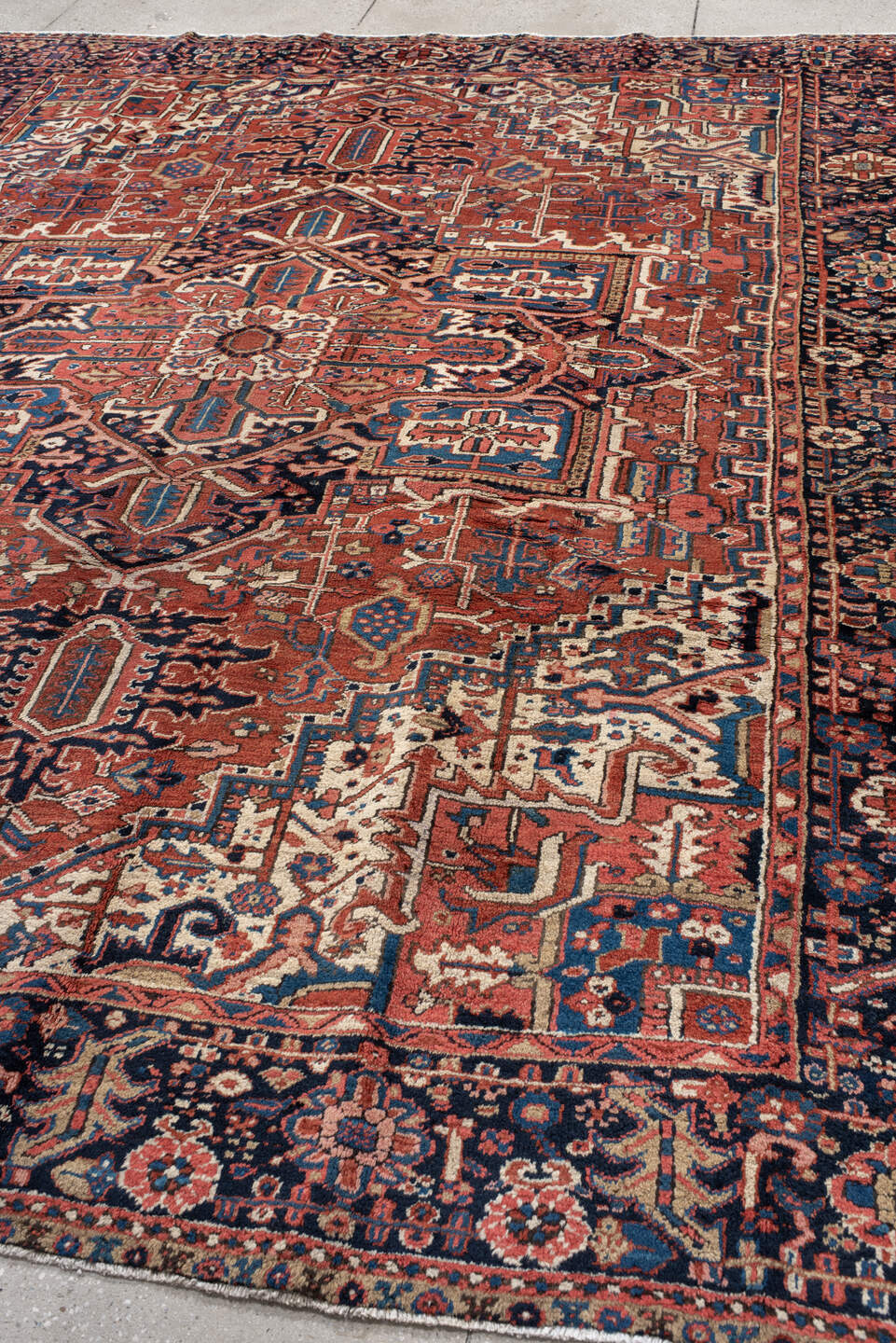 9' x 10' one-of-a-kind handmade antique Heriz large size rug. Color palette: rust, navy, ivory, sky_blue, crimson, camel