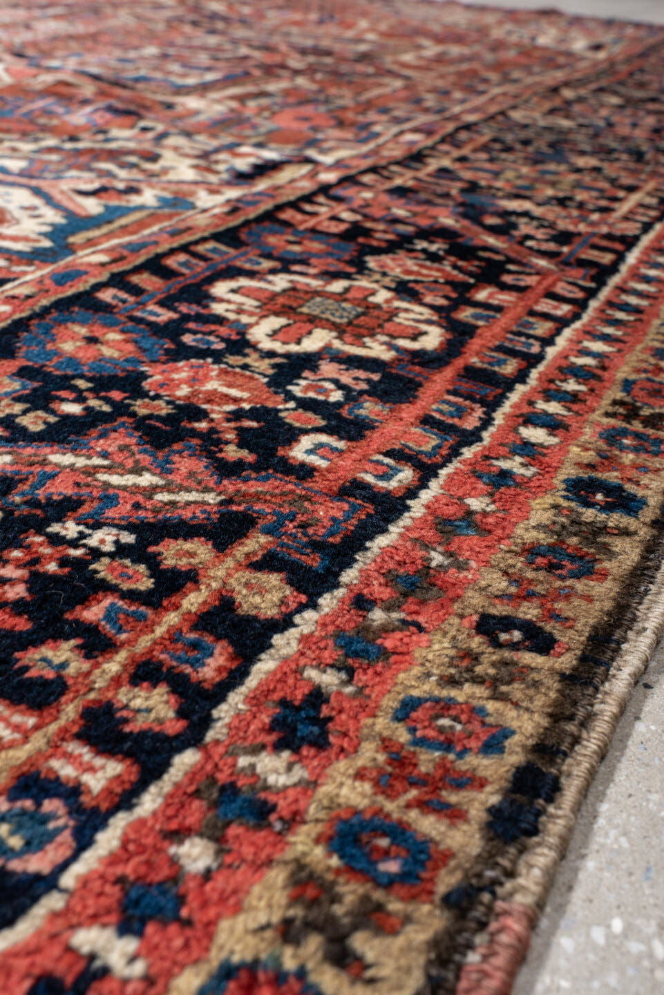 9' x 10' one-of-a-kind handmade antique Heriz large size rug. Color palette: rust, navy, ivory, sky_blue, crimson, camel