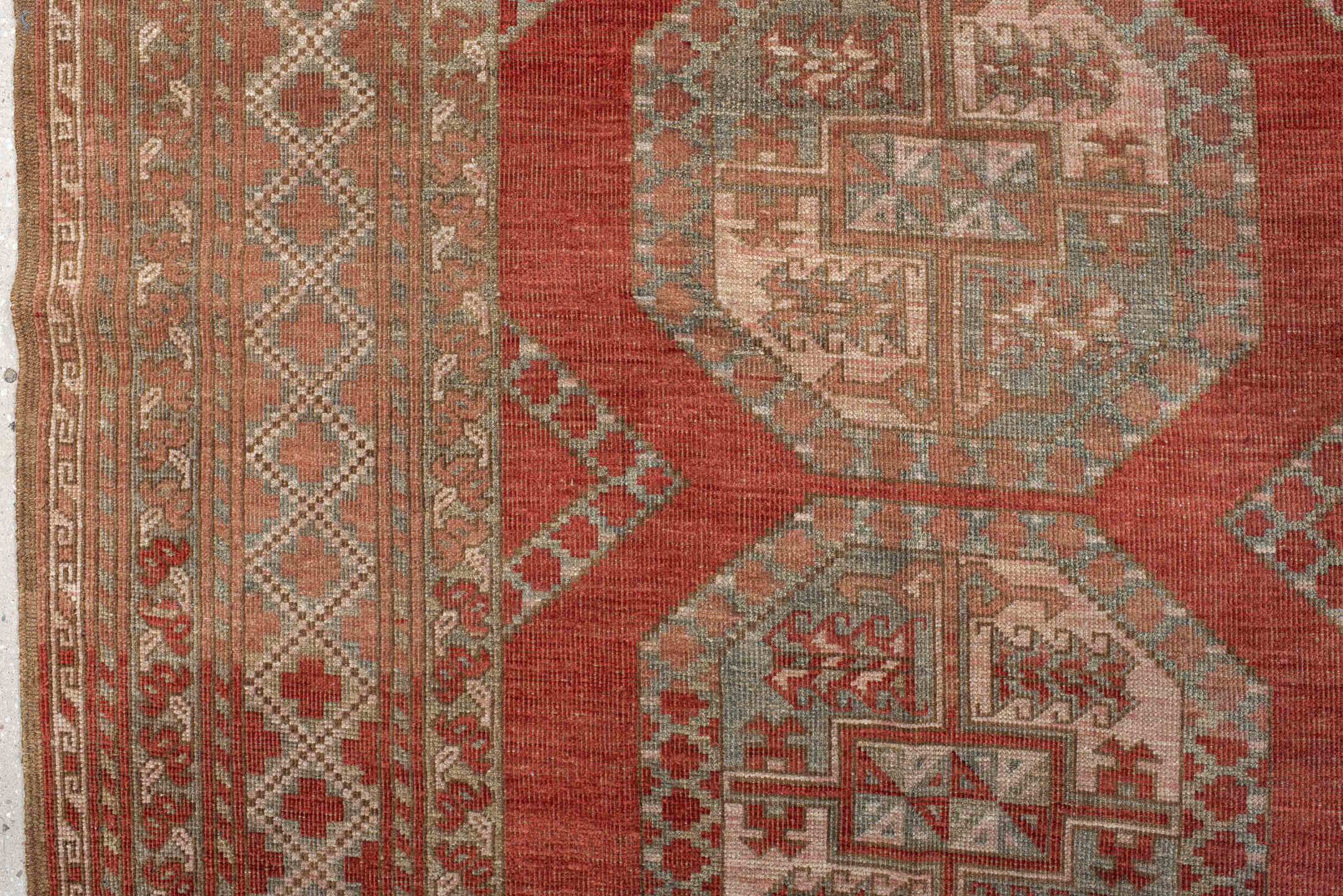 8' x 12' one-of-a-kind handmade antique Afghan large size rug. Color palette: rust, ivory, rose, sage, terra cotta, taupe