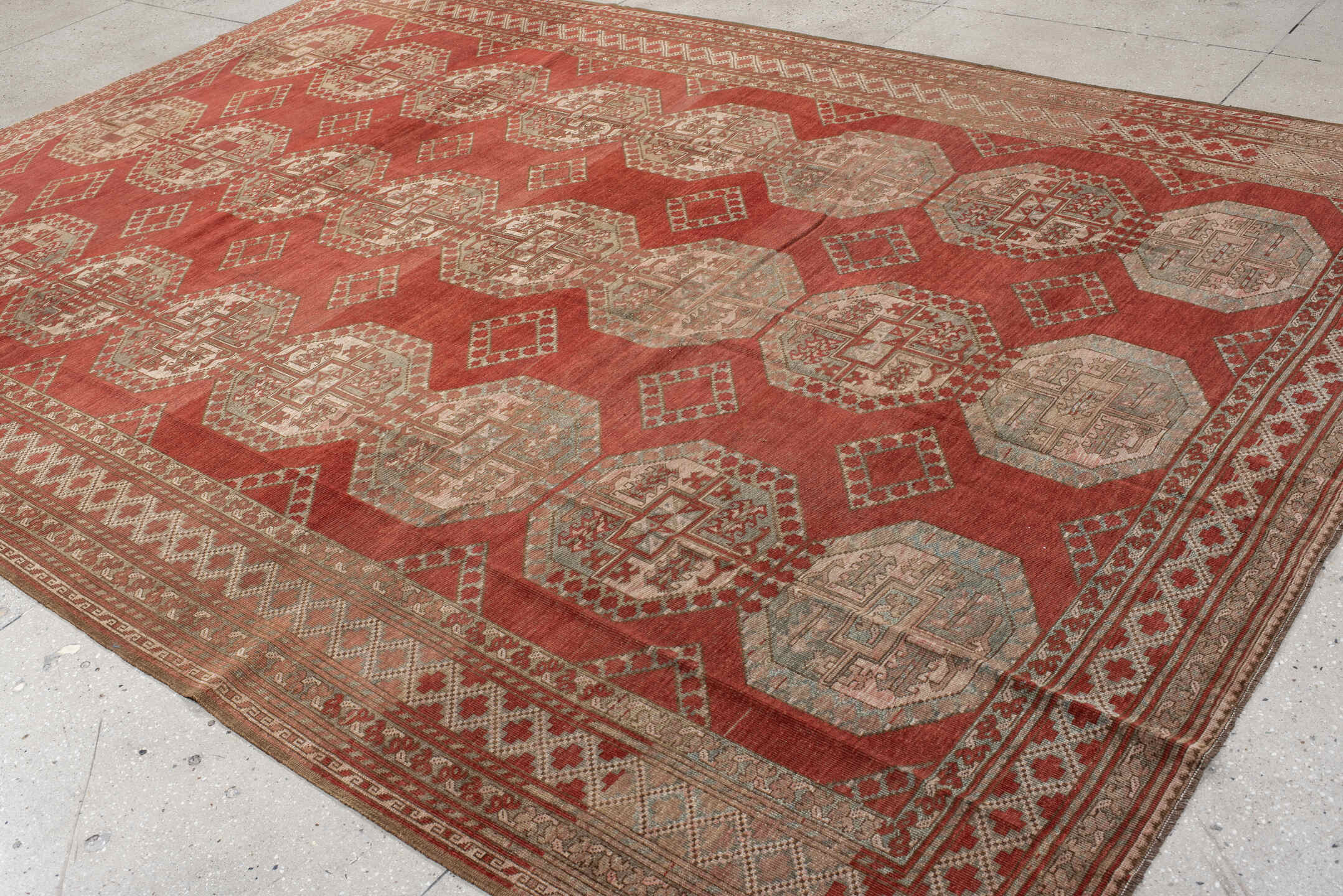 8' x 12' one-of-a-kind handmade antique Afghan large size rug. Color palette: rust, ivory, rose, sage, terra cotta, taupe
