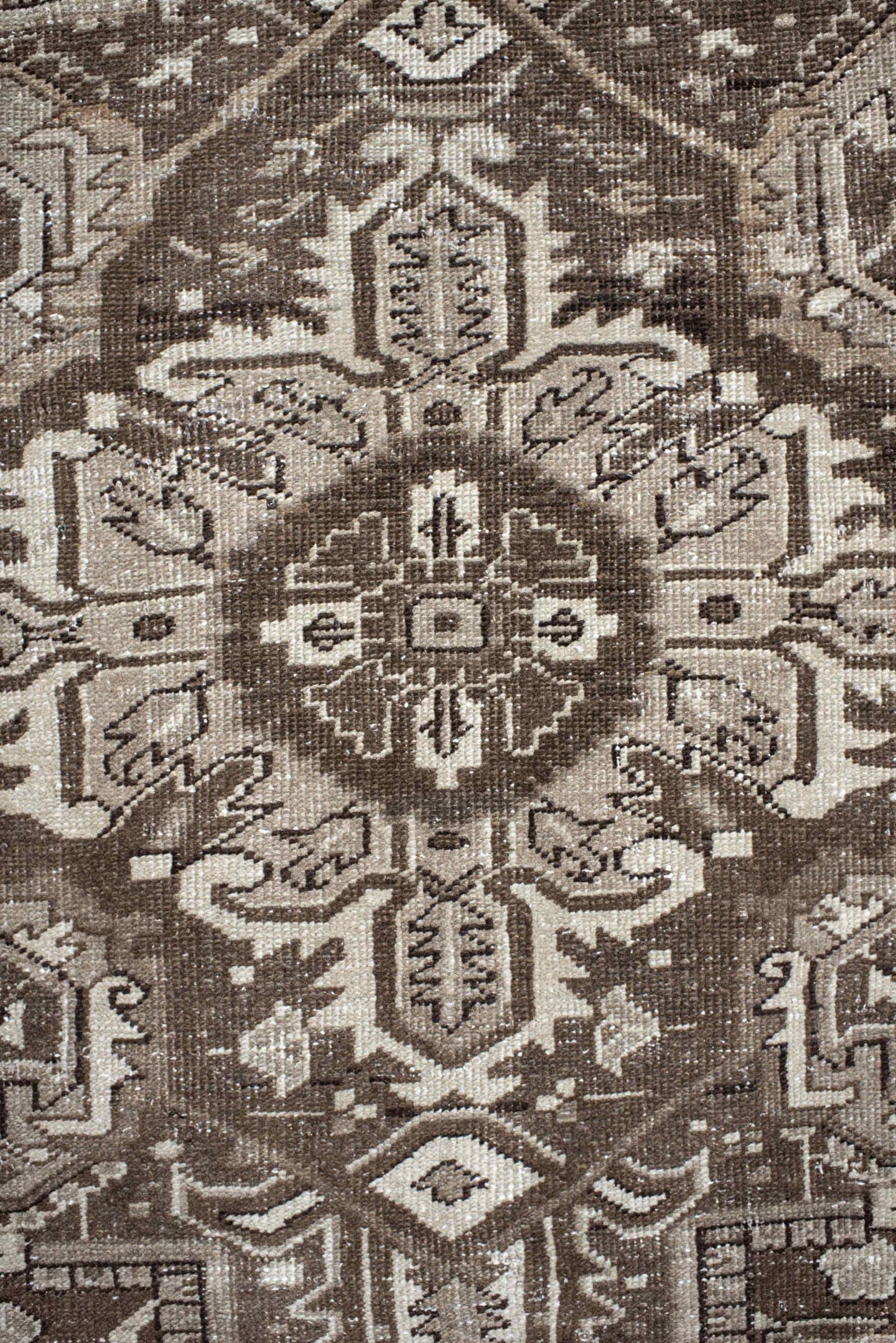 7' x 10' one-of-a-kind handmade antique Heriz large size rug. Color palette: taupe, brown, ivory, charcoal, camel, beige