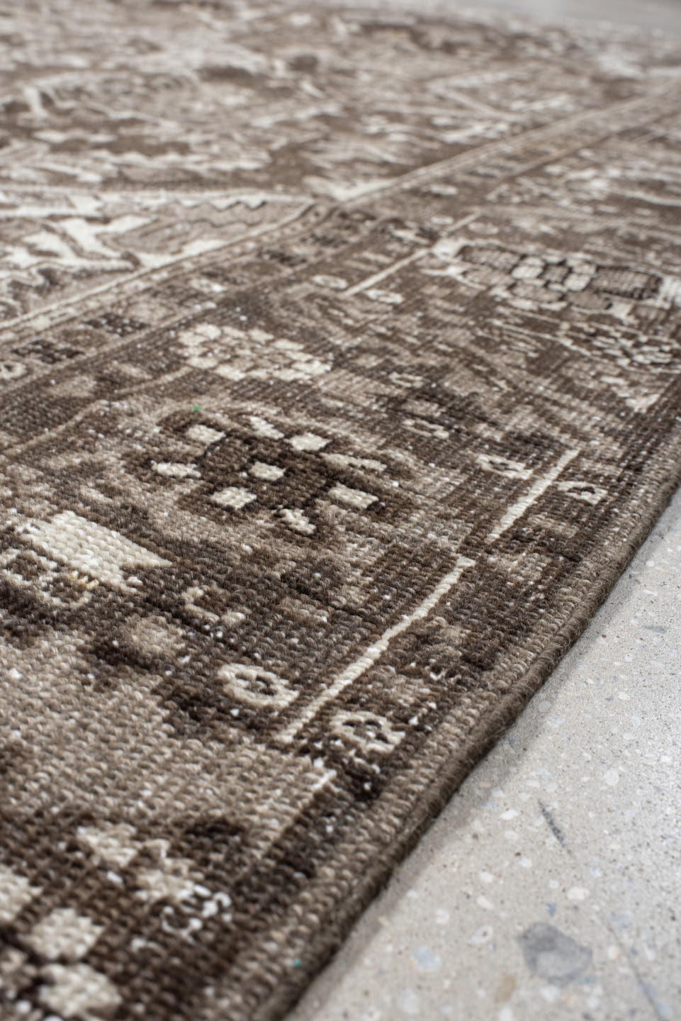 7' x 10' one-of-a-kind handmade antique Heriz large size rug. Color palette: taupe, brown, ivory, charcoal, camel, beige