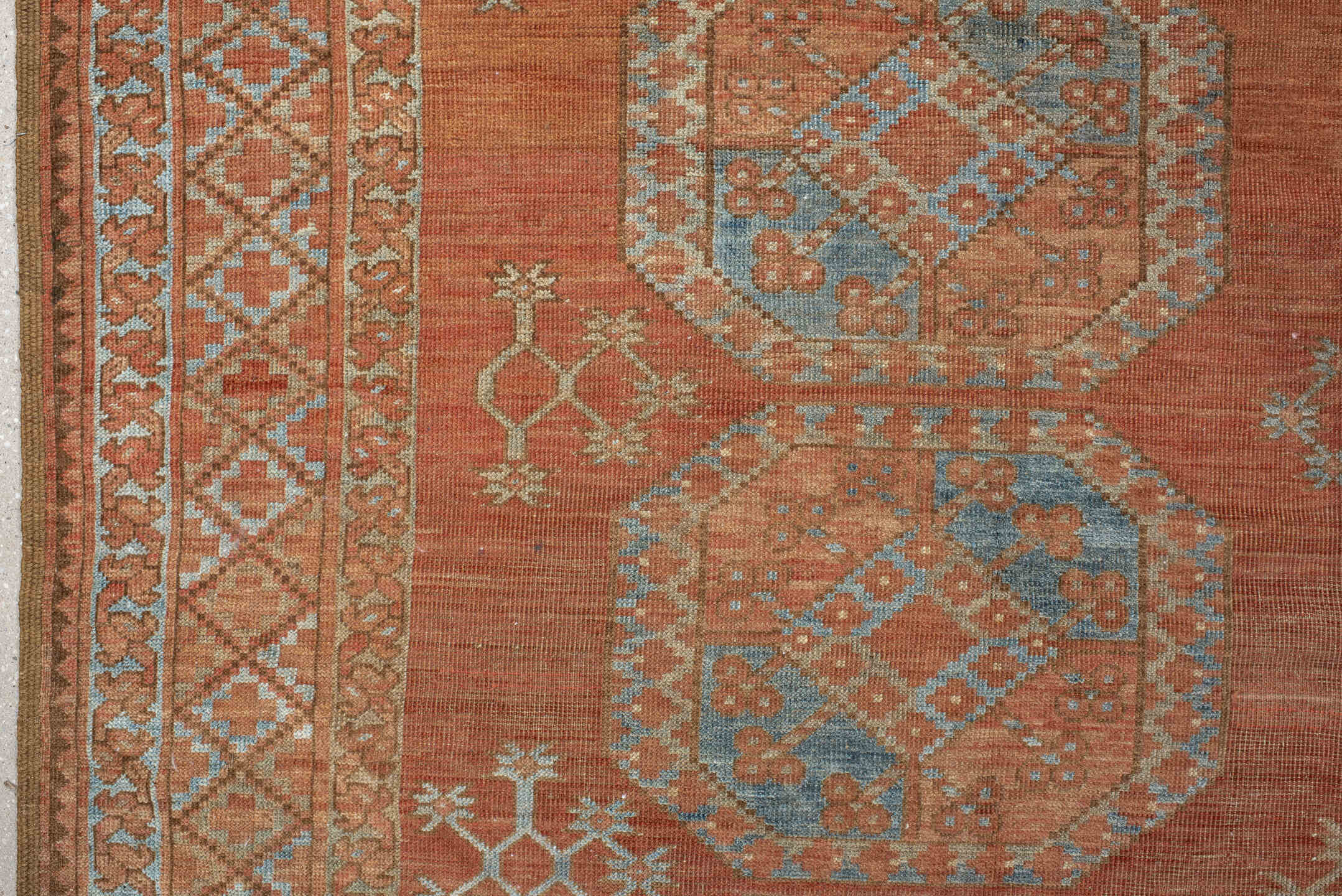 8' x 10' one-of-a-kind handmade antique Afghan large size rug. Color palette: terra cotta, rust, faded blue, salmon, camel