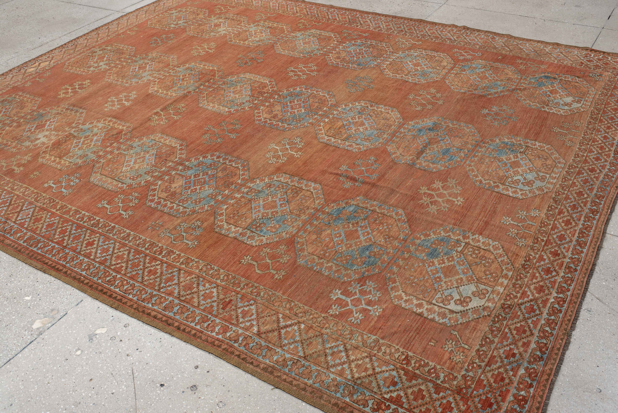 8' x 10' one-of-a-kind handmade antique Afghan large size rug. Color palette: terra cotta, rust, faded blue, salmon, camel