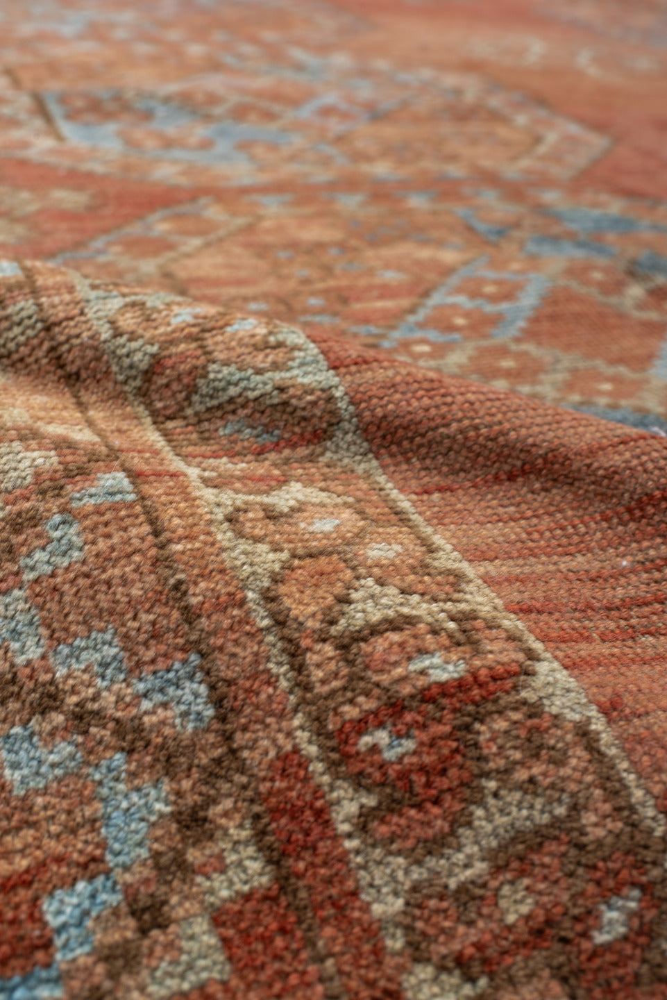8' x 10' one-of-a-kind handmade antique Afghan large size rug. Color palette: terra cotta, rust, faded blue, salmon, camel