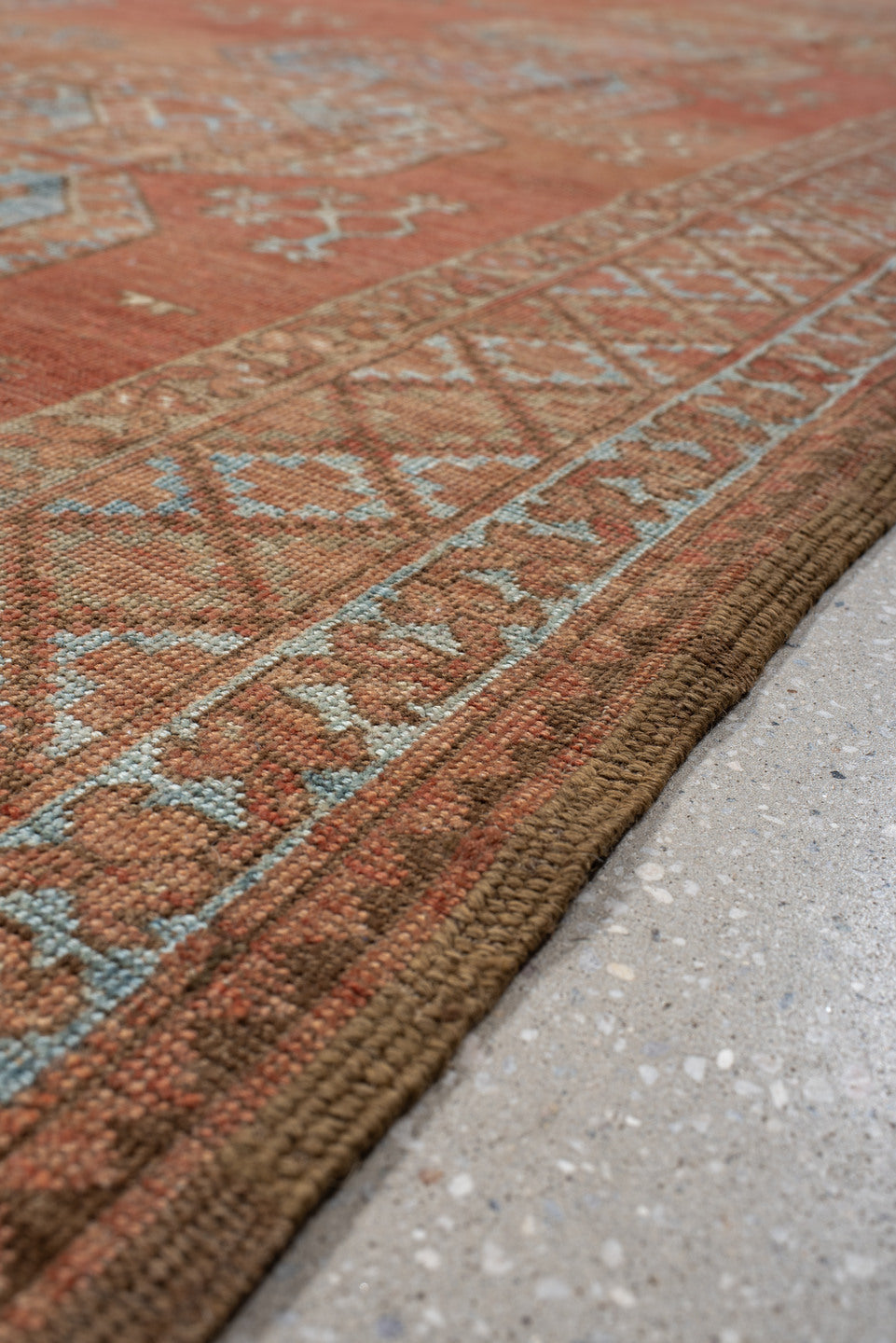 8' x 10' one-of-a-kind handmade antique Afghan large size rug. Color palette: terra cotta, rust, faded blue, salmon, camel