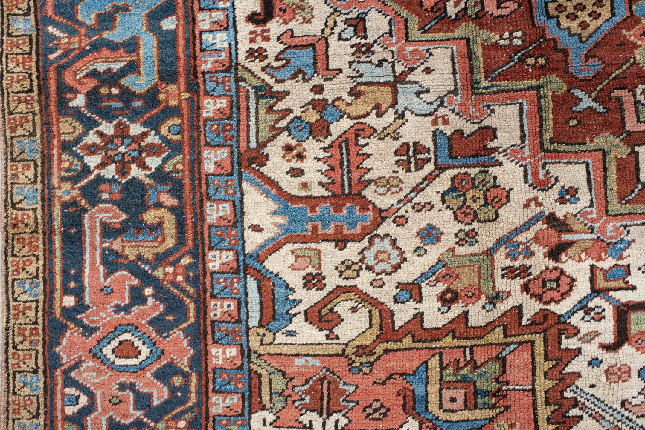 8' x 10' one-of-a-kind handmade antique Heriz large size rug. Color palette: rust, navy, ivory, sky blue, camel, coral, sage