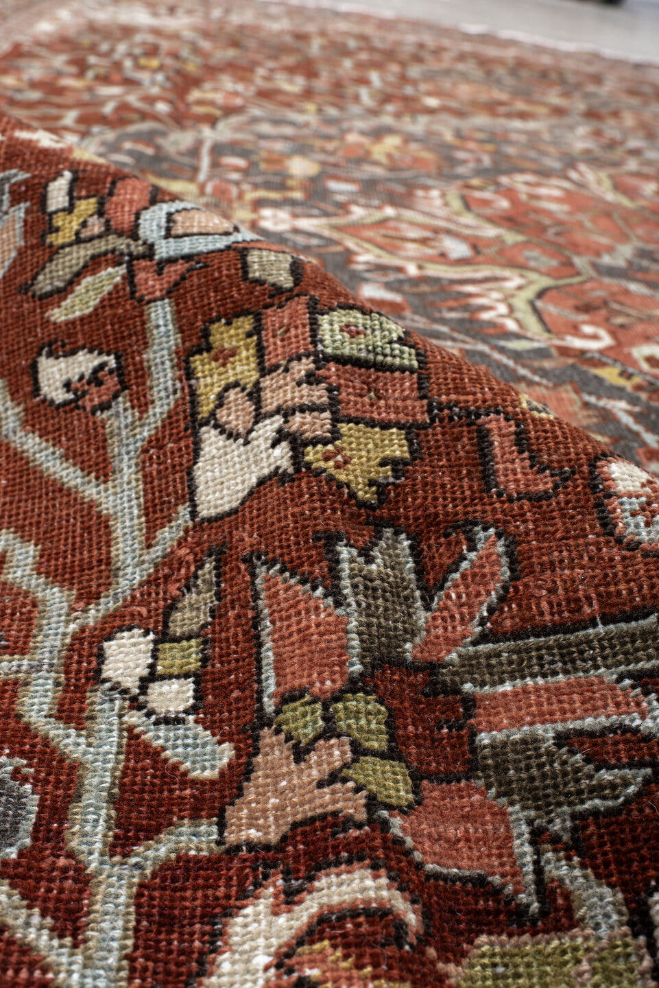 9' x 13' one-of-a-kind handmade vintage Heriz large size rug. Color palette: rust, slate, ivory, terra cotta, sage, charcoal