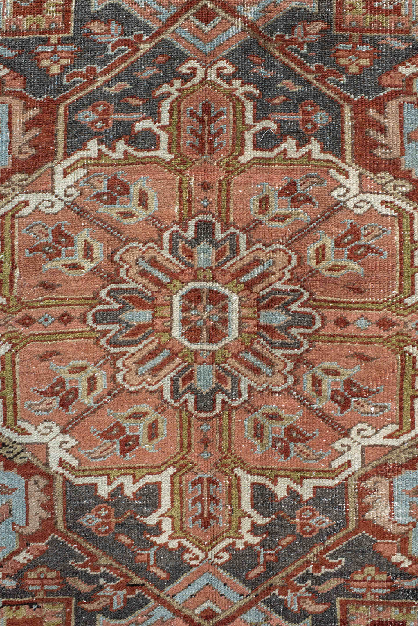9' x 12' one-of-a-kind handmade antique Heriz large size rug. Color palette: rust, ivory, navy, terra cotta, sage, camel