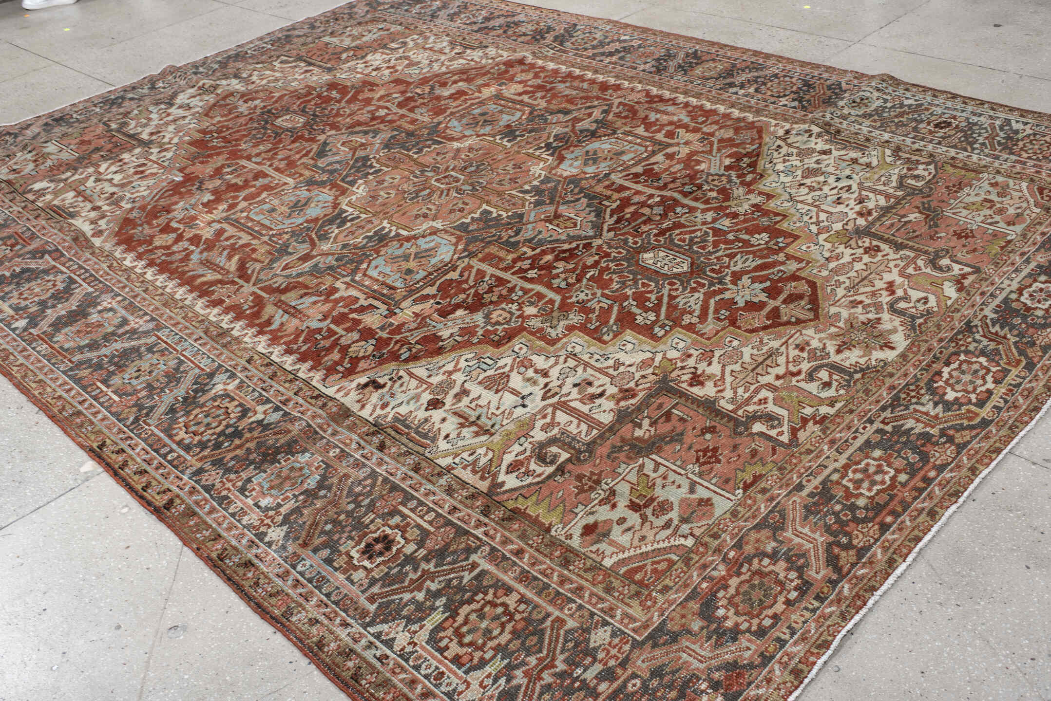 9' x 12' one-of-a-kind handmade vintage Heriz large size rug. Color palette: black, blue, brown, charcoal, gray, light gray