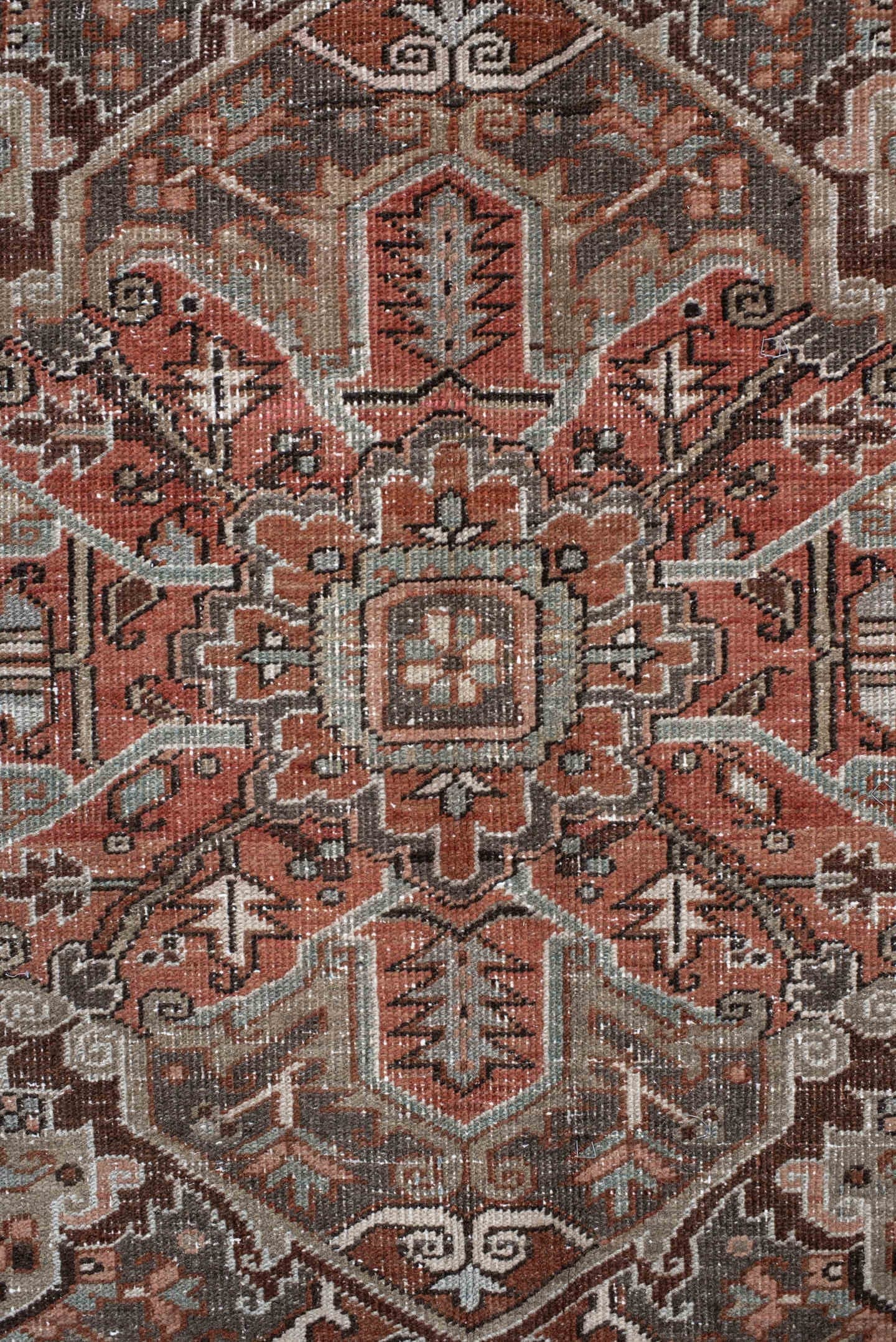 9' x 12' one-of-a-kind handmade antique Heriz large size rug. Color palette: rust, ivory, charcoal, taupe, terra cotta