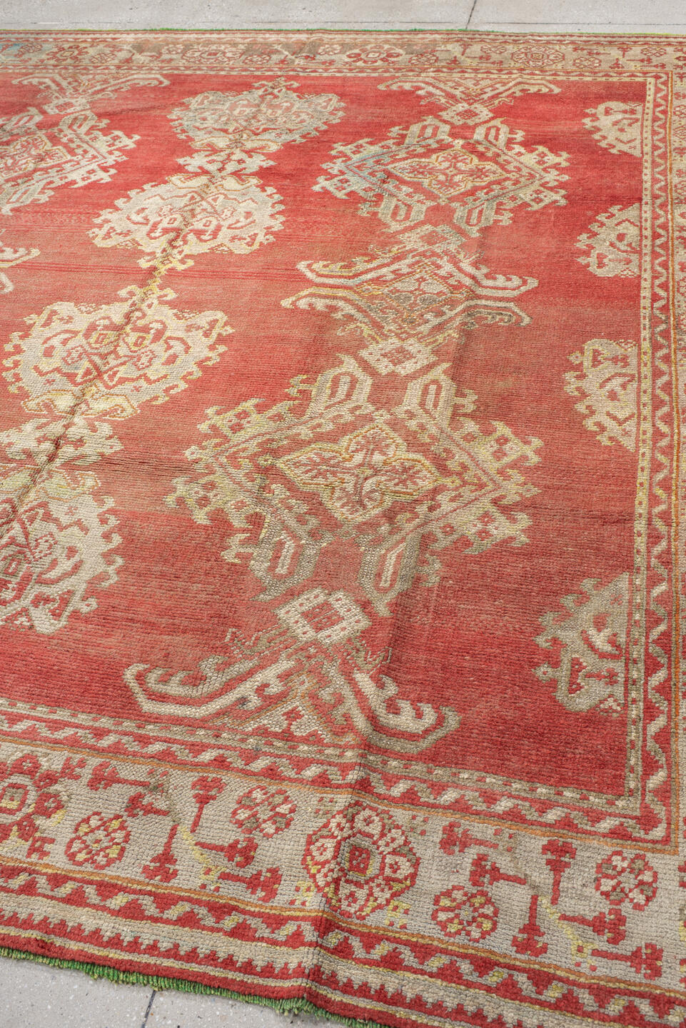 9' x 9' one-of-a-kind handmade antique Oushak rug. Color palette: terra cotta, ivory, rose, salmon, beige, sage, terracotta