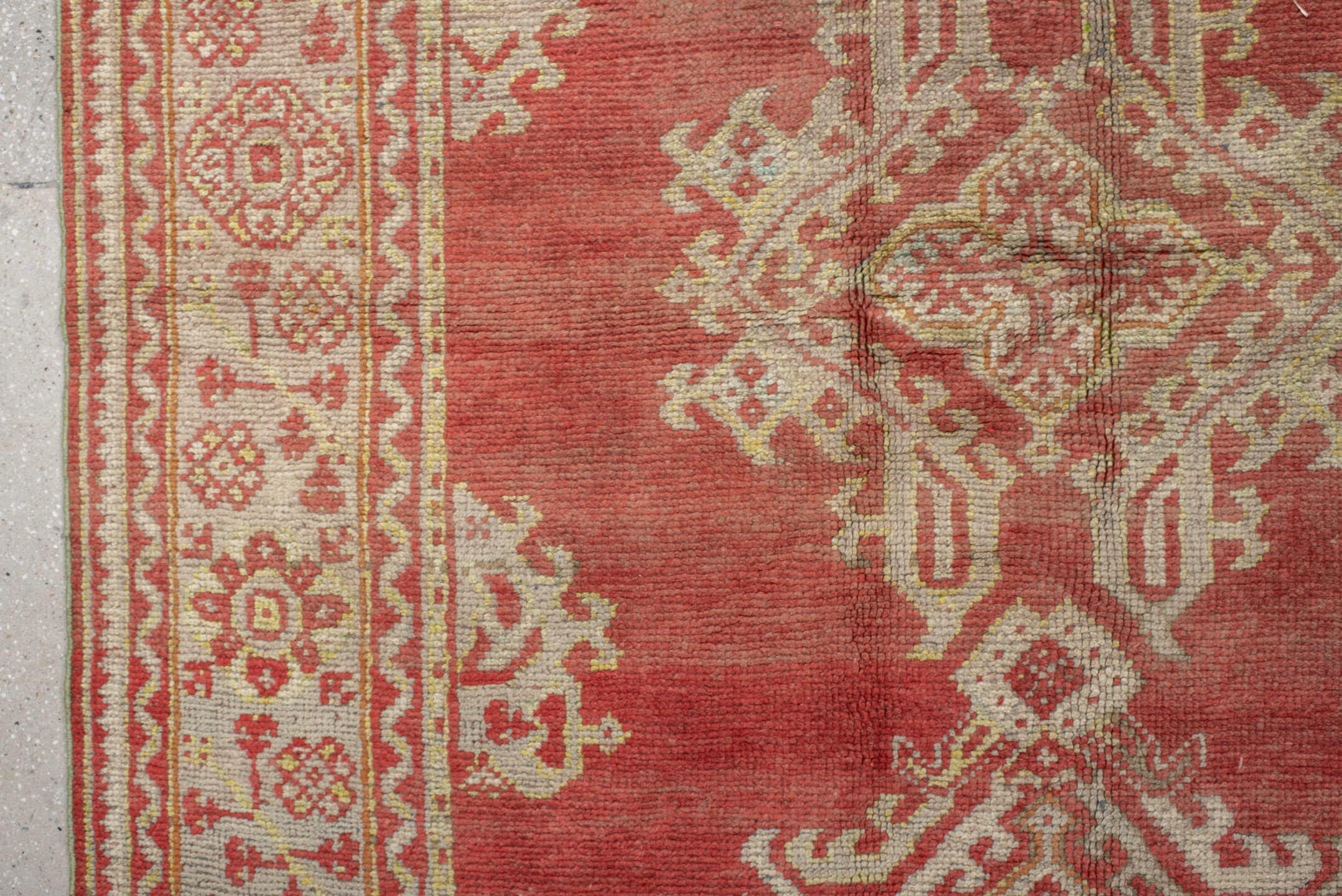 9' x 9' one-of-a-kind handmade antique Oushak rug. Color palette: terra cotta, ivory, rose, salmon, beige, sage, terracotta