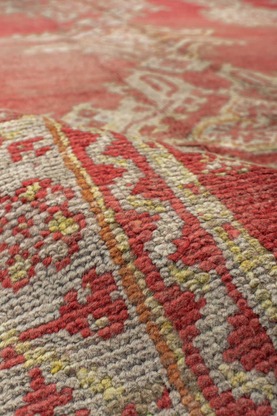 9' x 9' one-of-a-kind handmade antique Oushak rug. Color palette: terra cotta, ivory, rose, salmon, beige, sage, terracotta