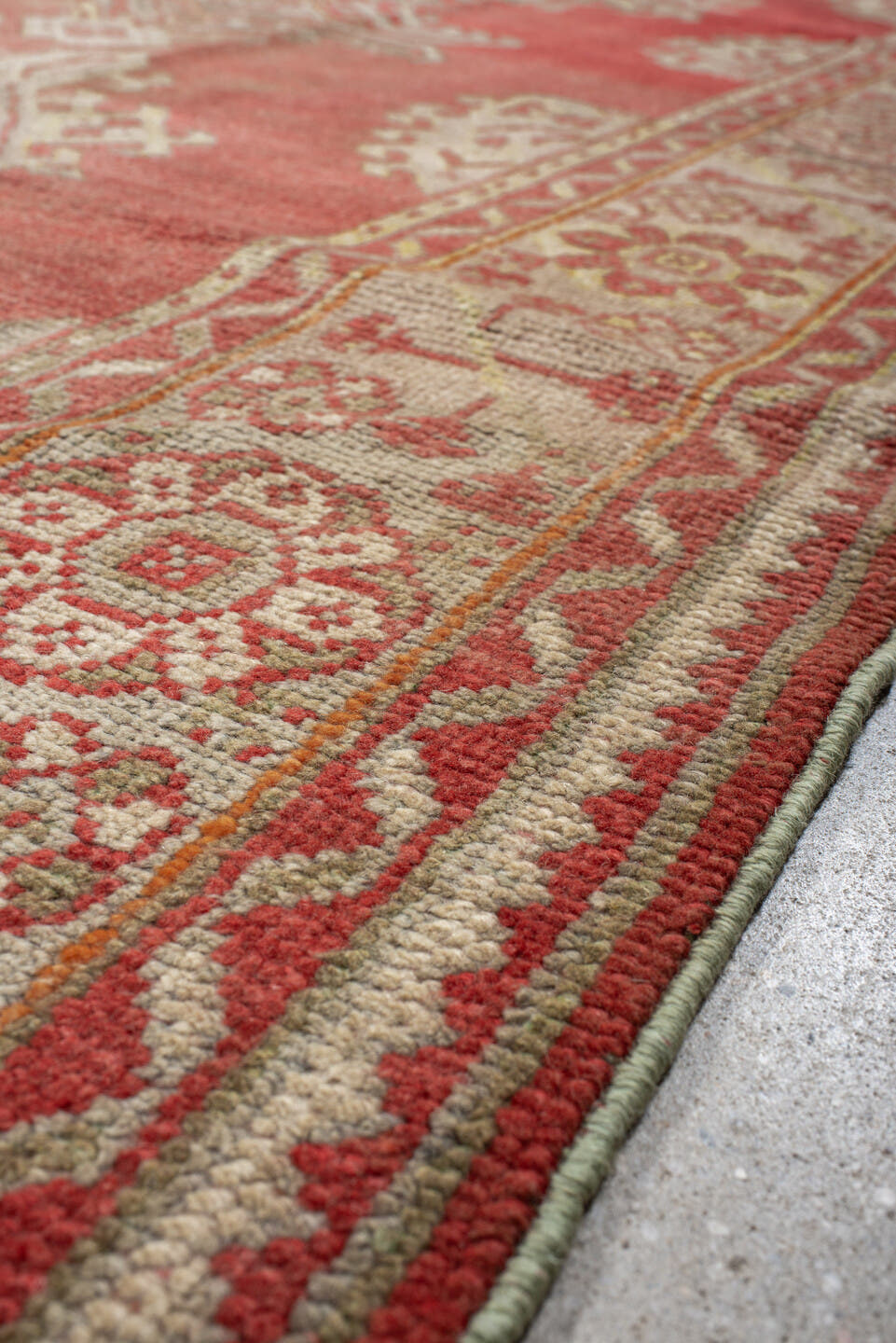 9' x 9' one-of-a-kind handmade antique Oushak rug. Color palette: terra cotta, ivory, rose, salmon, beige, sage, terracotta