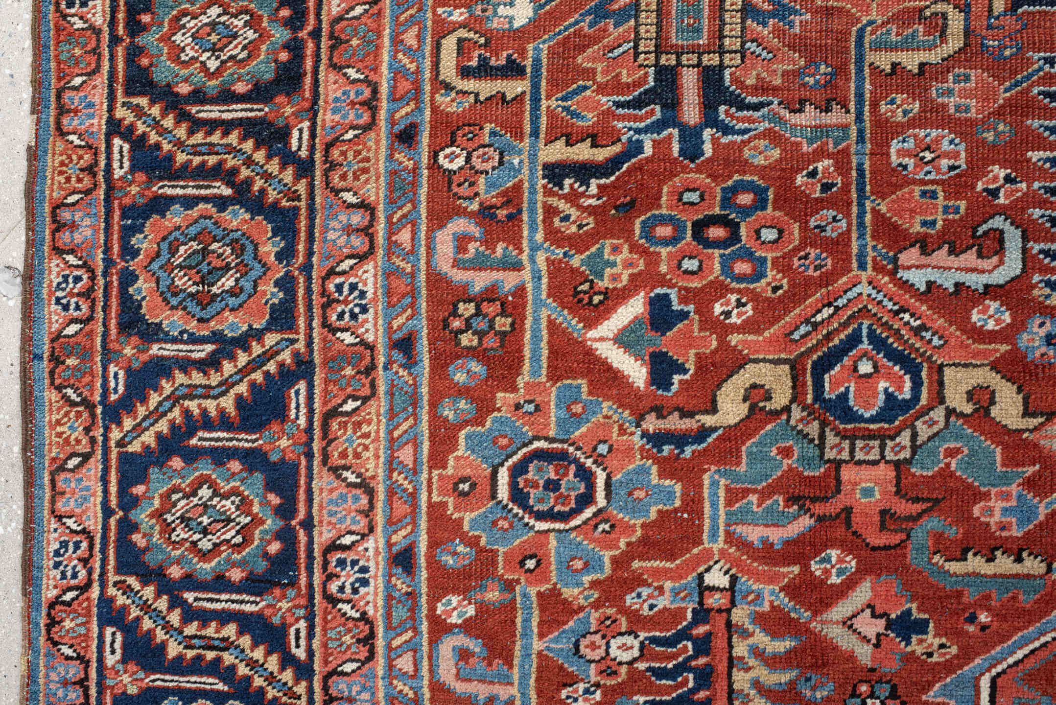 9' x 12' one-of-a-kind handmade antique Heriz large size rug. Color palette: rust, navy, ivory, sky_blue, coral, sage, camel