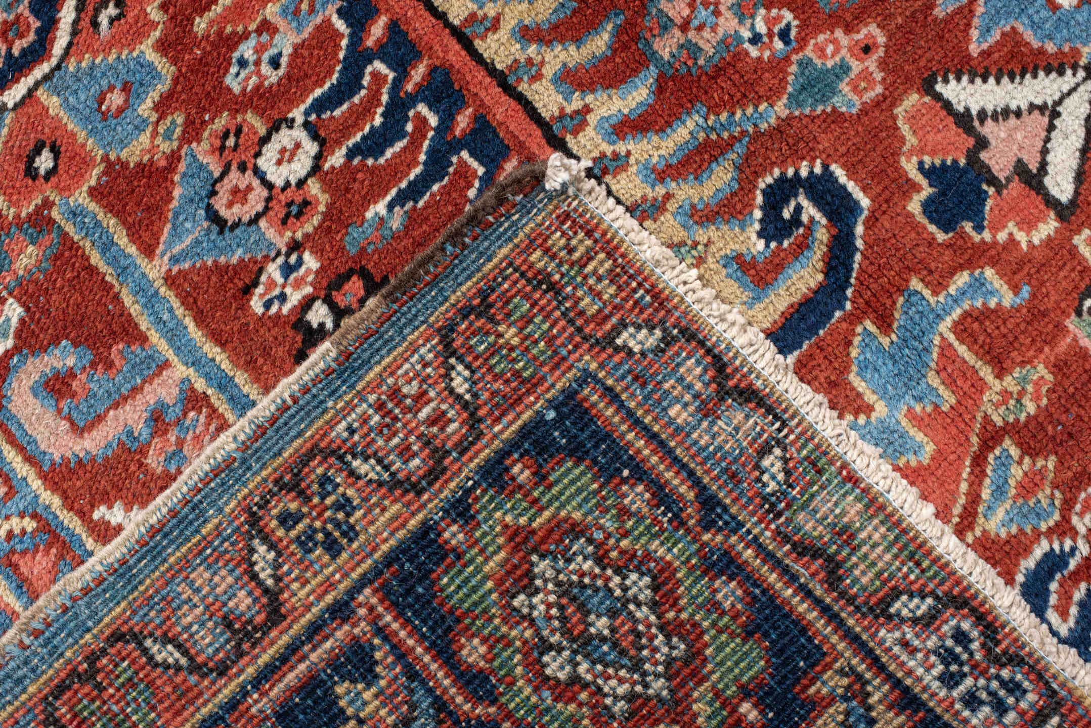 9' x 12' one-of-a-kind handmade antique Heriz large size rug. Color palette: rust, navy, ivory, sky_blue, coral, sage, camel