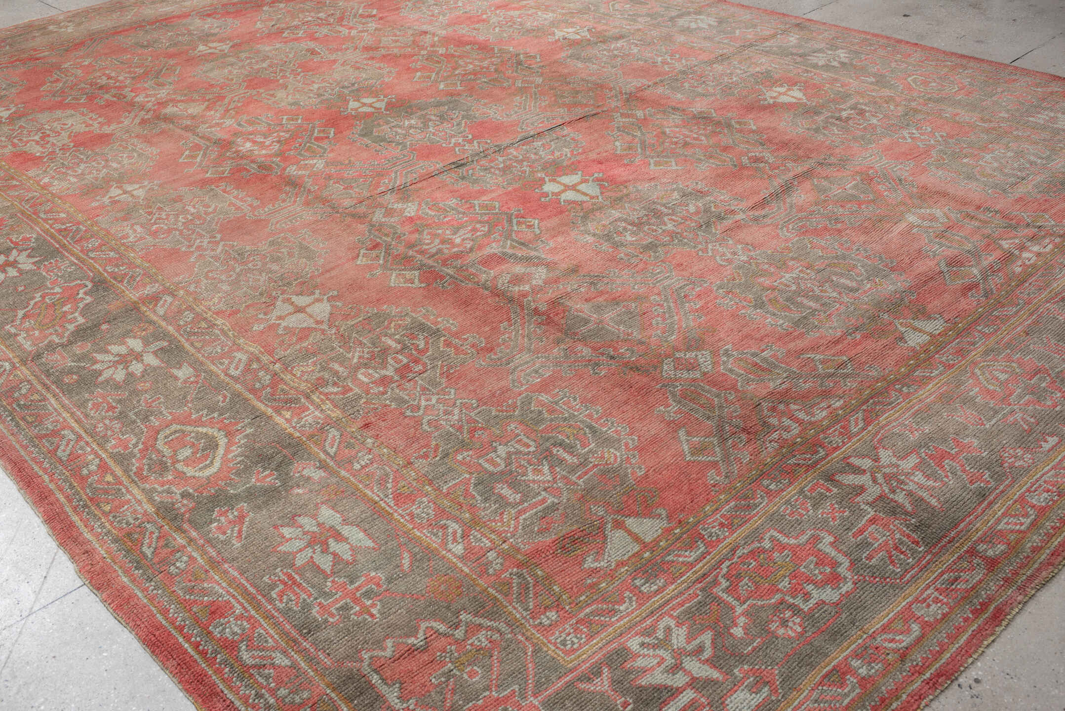 11' x 17' one-of-a-kind handmade vintage Oushak oversize rug. Color palette: coral, taupe, sage, ivory, rose, terracotta