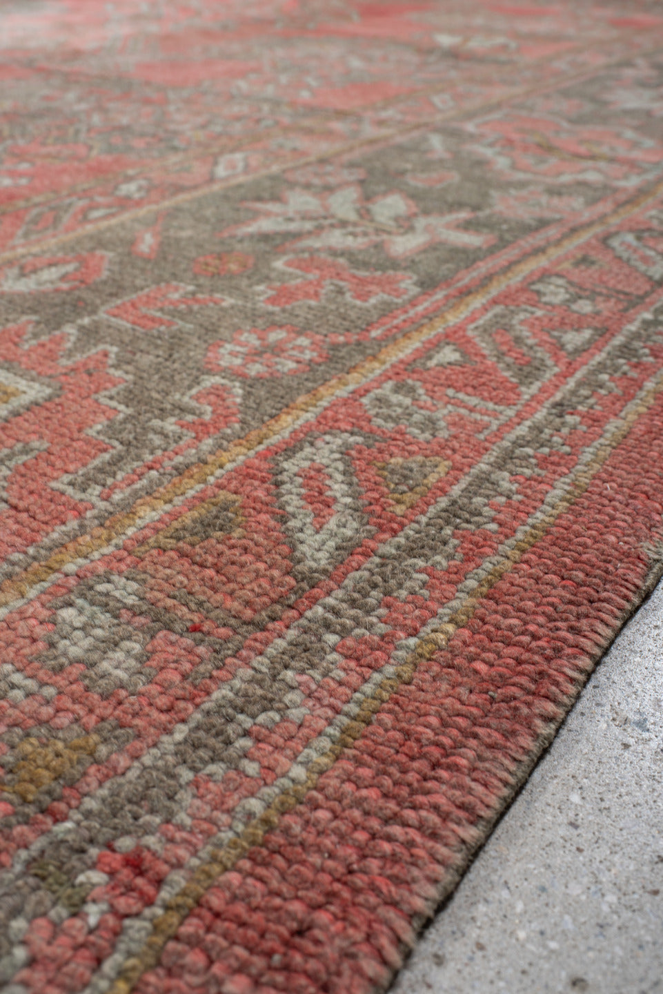 11' x 17' one-of-a-kind handmade vintage Oushak oversize rug. Color palette: coral, taupe, sage, ivory, rose, terracotta