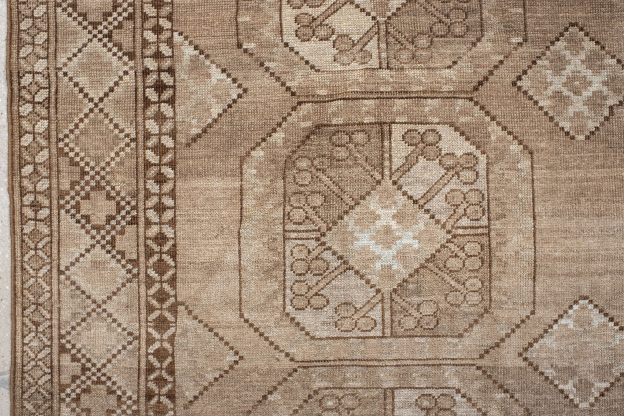 7' x 10' one-of-a-kind handmade vintage Afghan large size rug. Color palette: brown, gray, light gray, off-white, orange