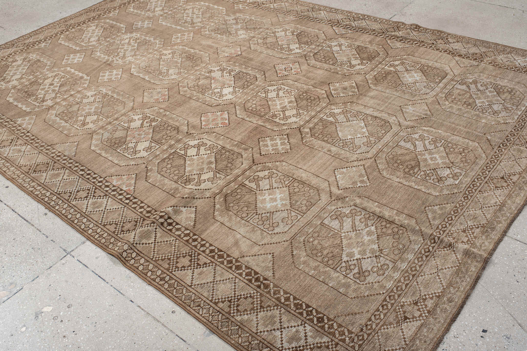 7' x 10' one-of-a-kind handmade antique Afghan large size rug. Color palette: camel, taupe, ivory, beige, blush, brown, gray