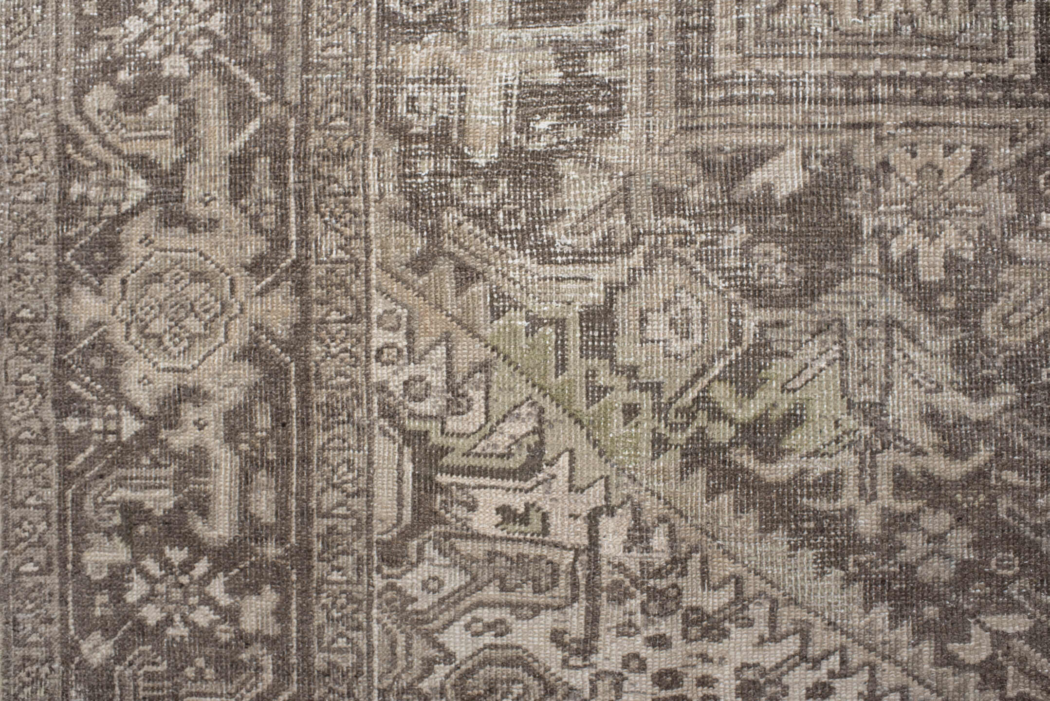 7' x 10' one-of-a-kind handmade antique Heriz large size rug. Color palette: taupe, brown, ivory, charcoal, beige, gray