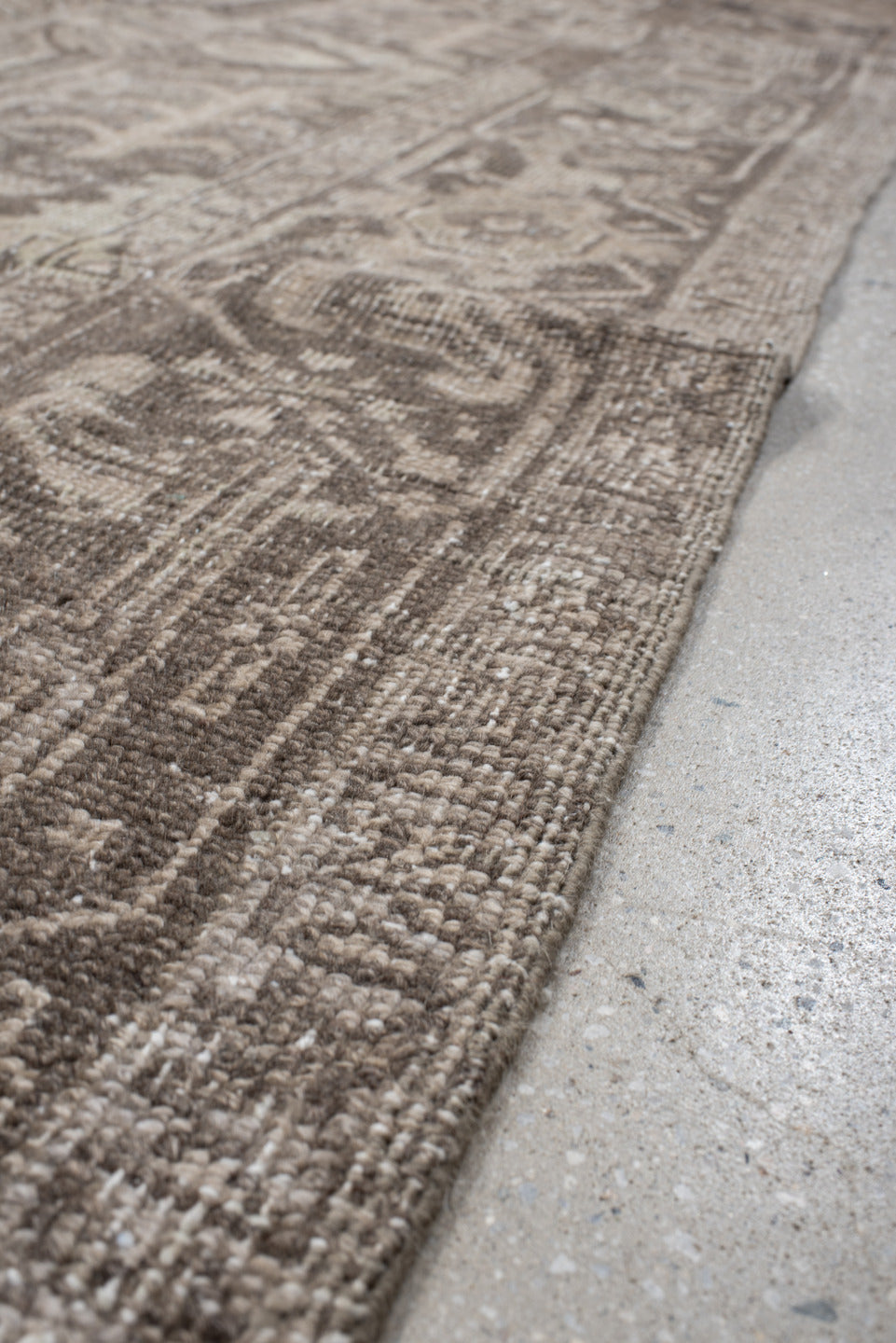 7' x 10' one-of-a-kind handmade antique Heriz large size rug. Color palette: taupe, brown, ivory, charcoal, beige, gray