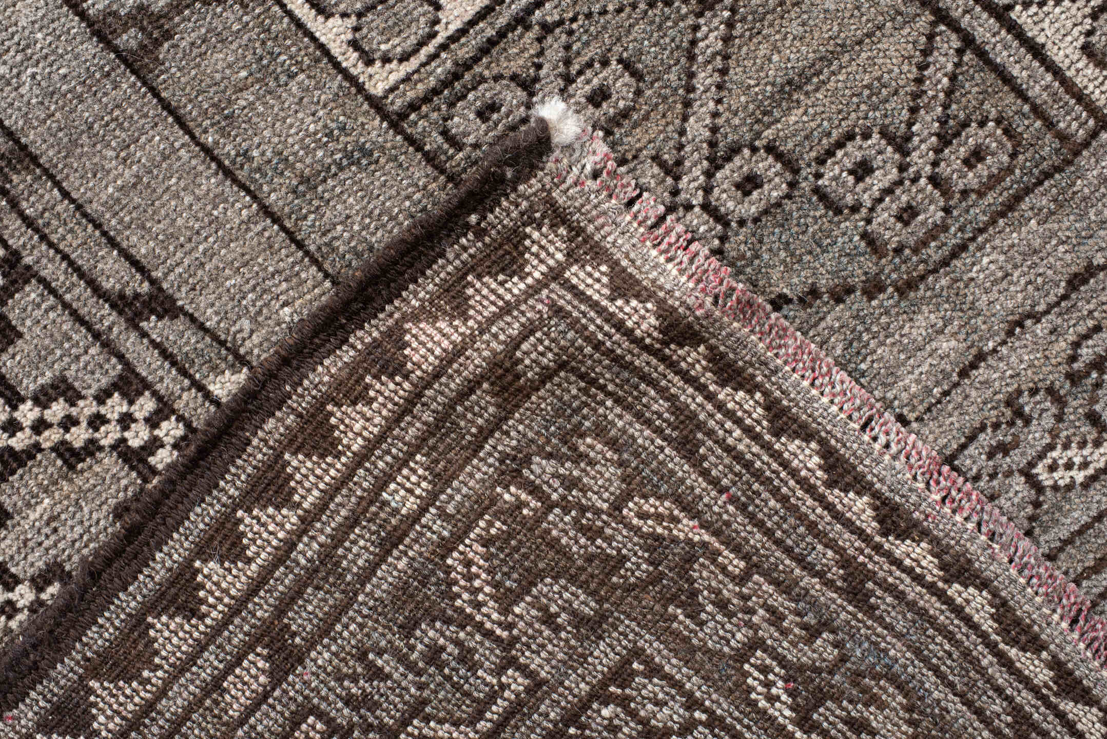 7' x 10' one-of-a-kind handmade vintage Afghan large size rug. Color palette: black, brown, gray, light gray, off-white