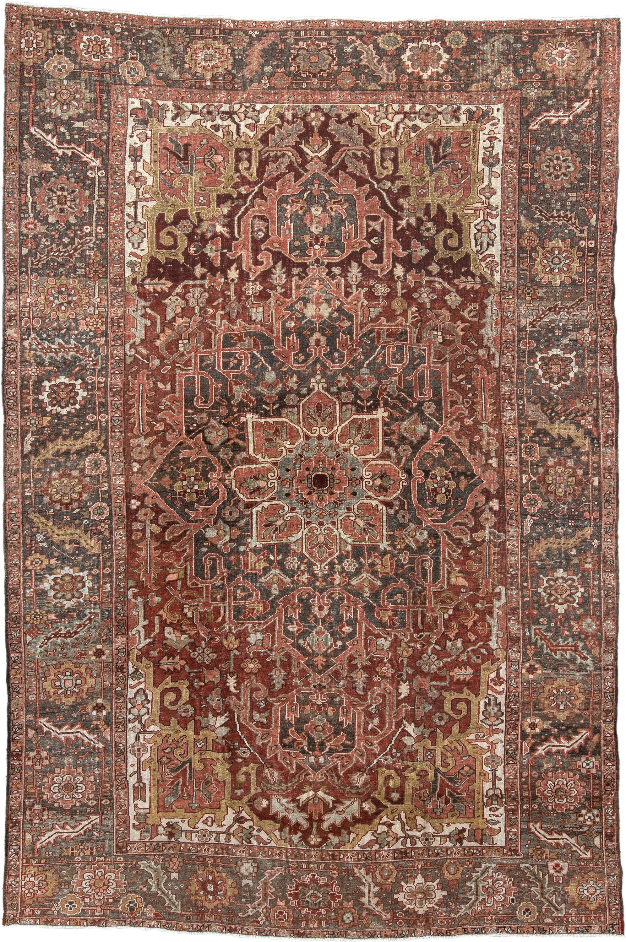 7' x 11' one-of-a-kind handmade antique Heriz large size rug. Color palette: rust, brick, slate, ivory, camel, taupe