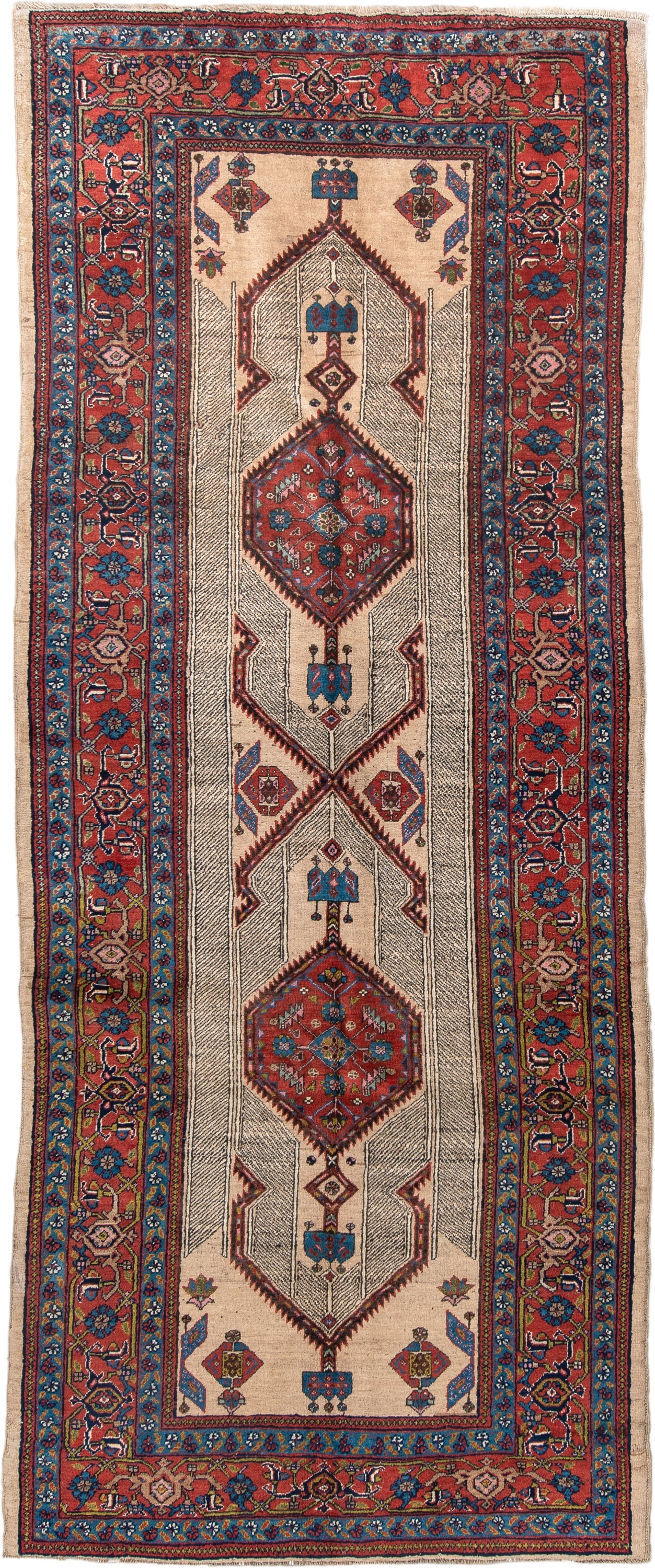 4' x 11' one-of-a-kind handmade antique Sarab runner rug. Color palette: ivory, rust, indigo, navy, crimson, camel, saffron