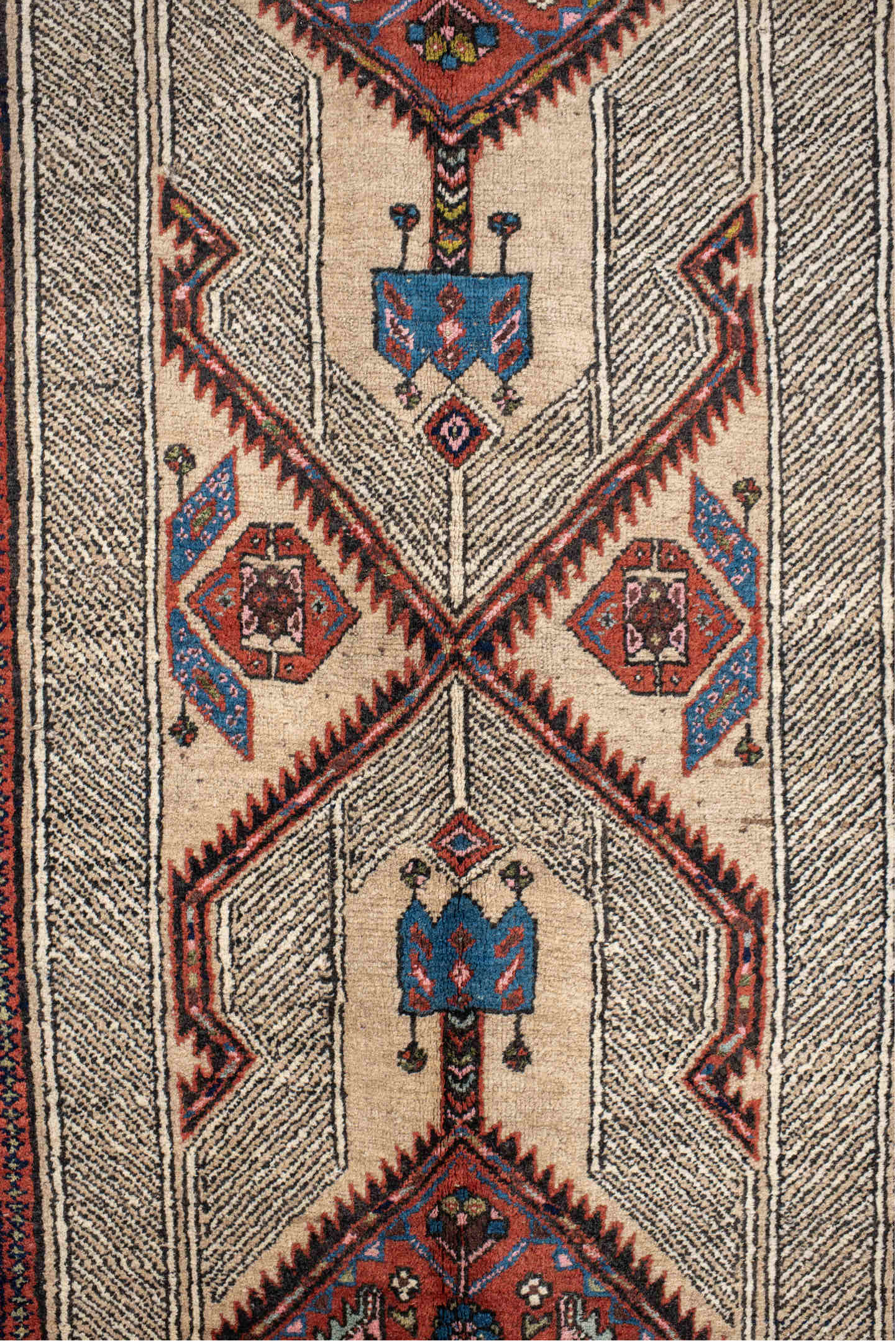 4' x 11' one-of-a-kind handmade antique Sarab runner rug. Color palette: ivory, rust, indigo, navy, crimson, camel, saffron