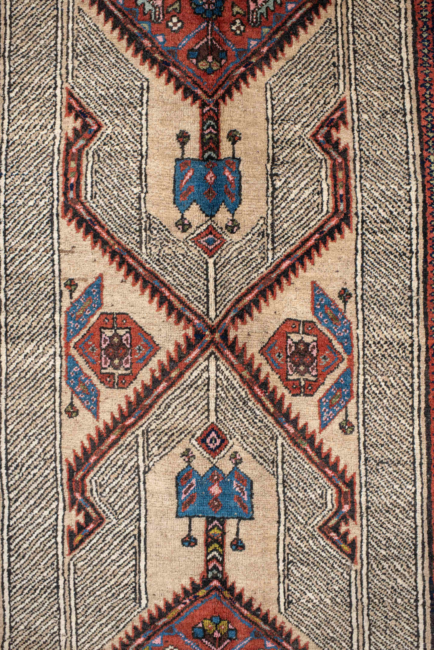 4' x 11' one-of-a-kind handmade antique Sarab runner rug. Color palette: ivory, rust, indigo, navy, crimson, camel, saffron